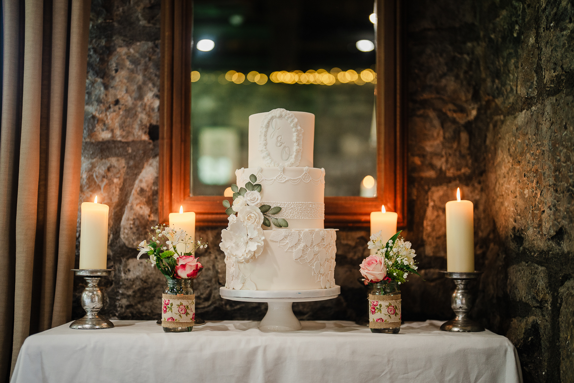 A wedding cake with candles