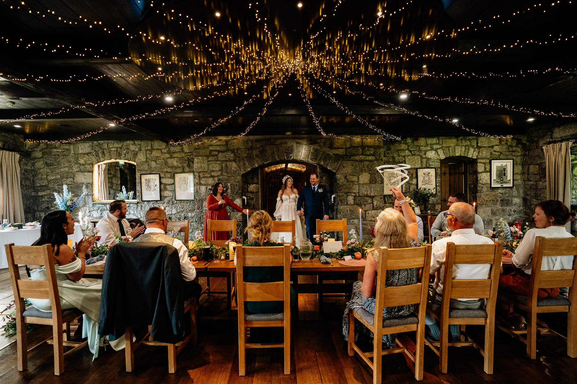 A group of people sitting at tables