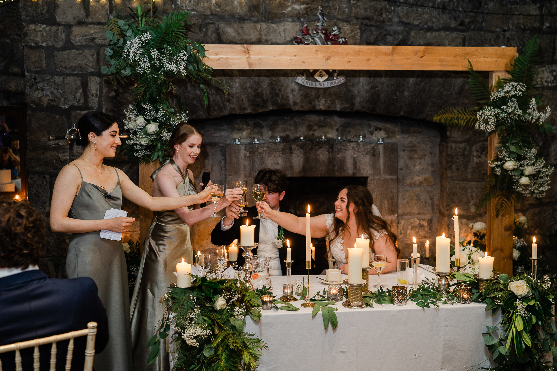 A group of people drinking wine