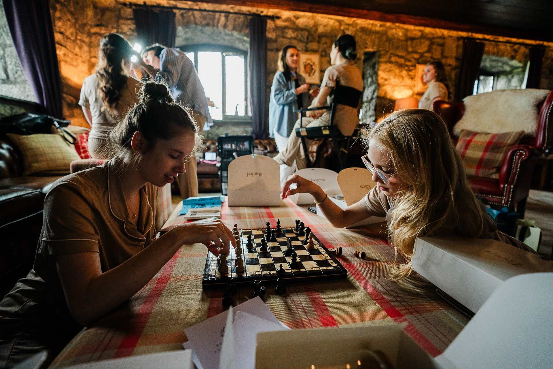 A group of women playing a board game