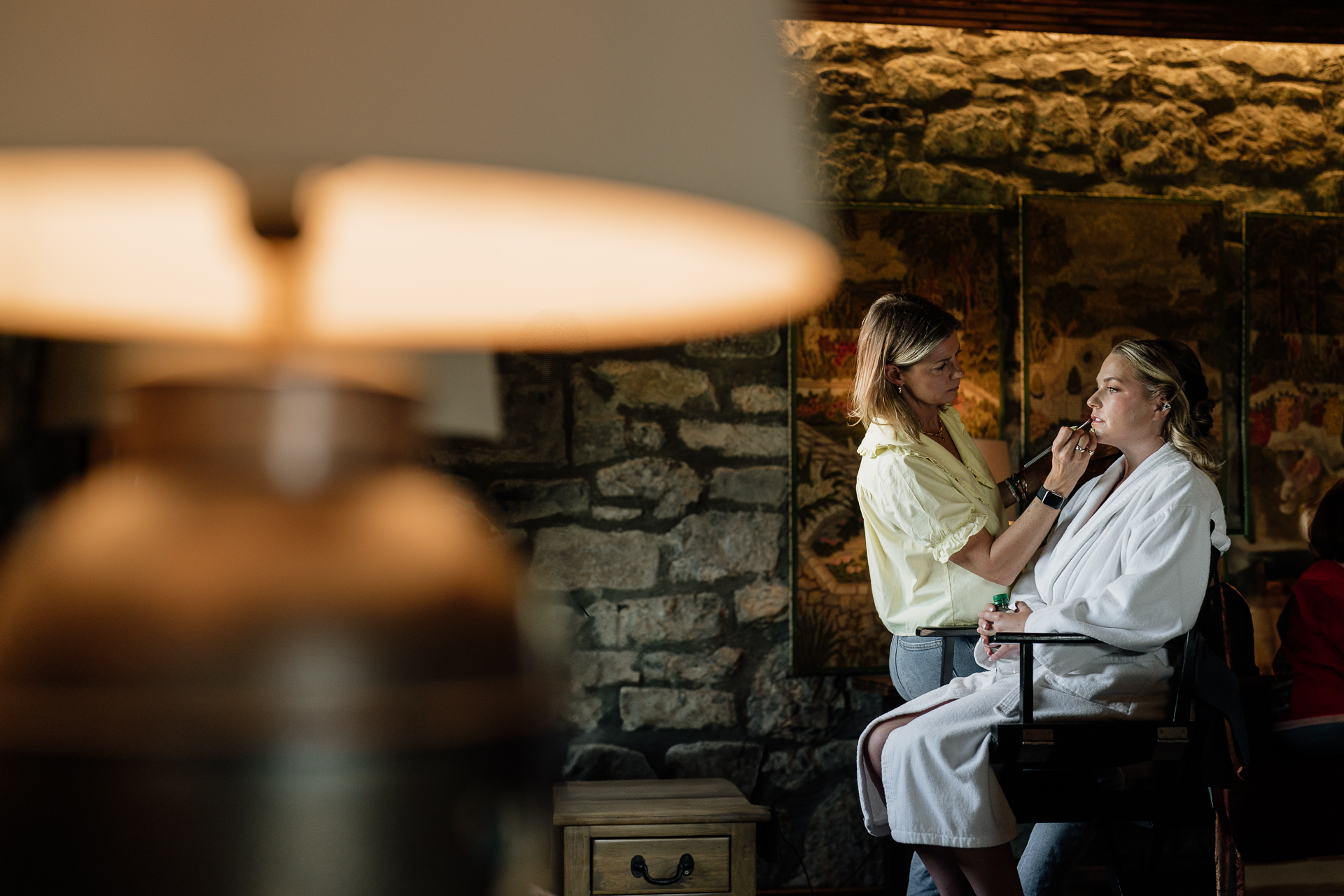 A couple of women sitting in chairs