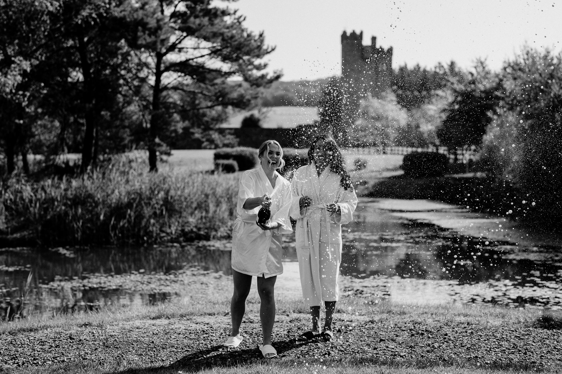 A man and woman standing in a park