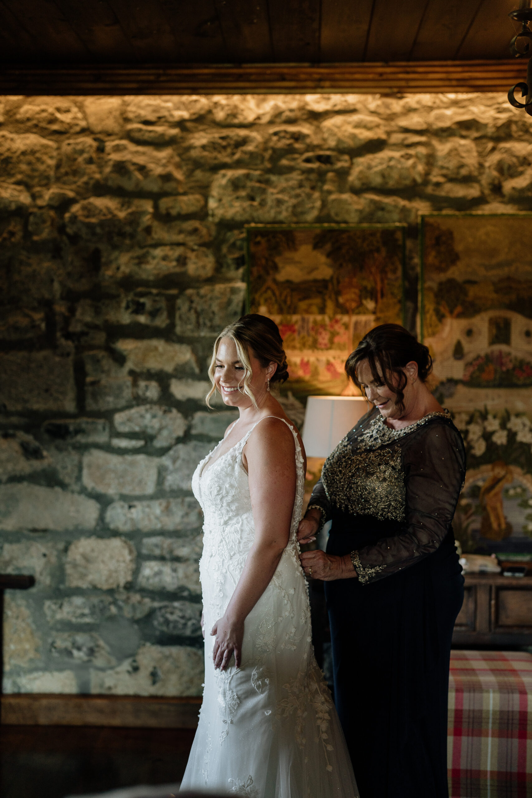 A person in a white dress and a person in a black dress