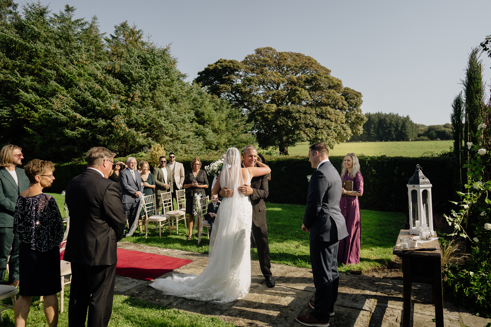 A bride and groom walking down the aisle