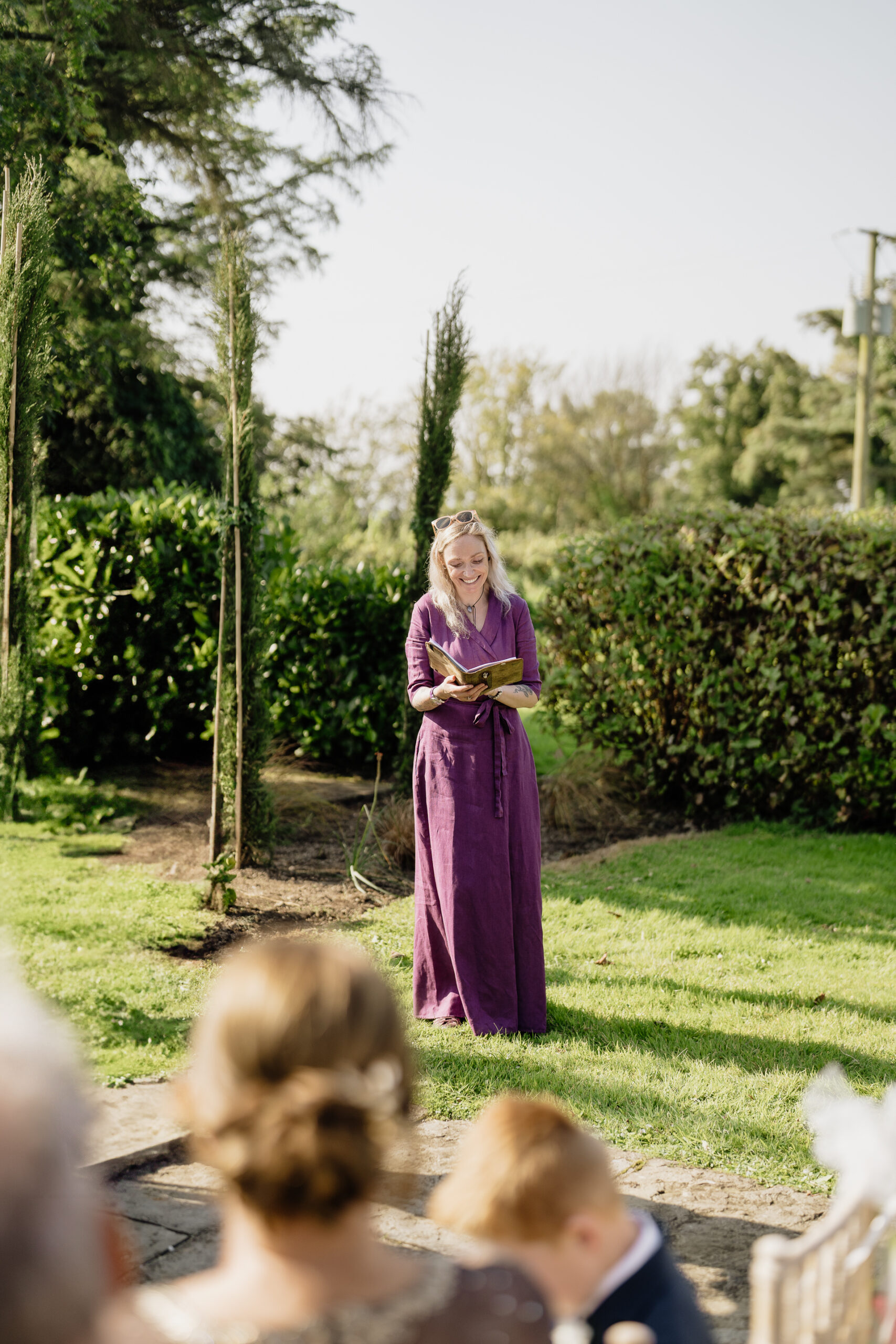 A woman in a purple dress