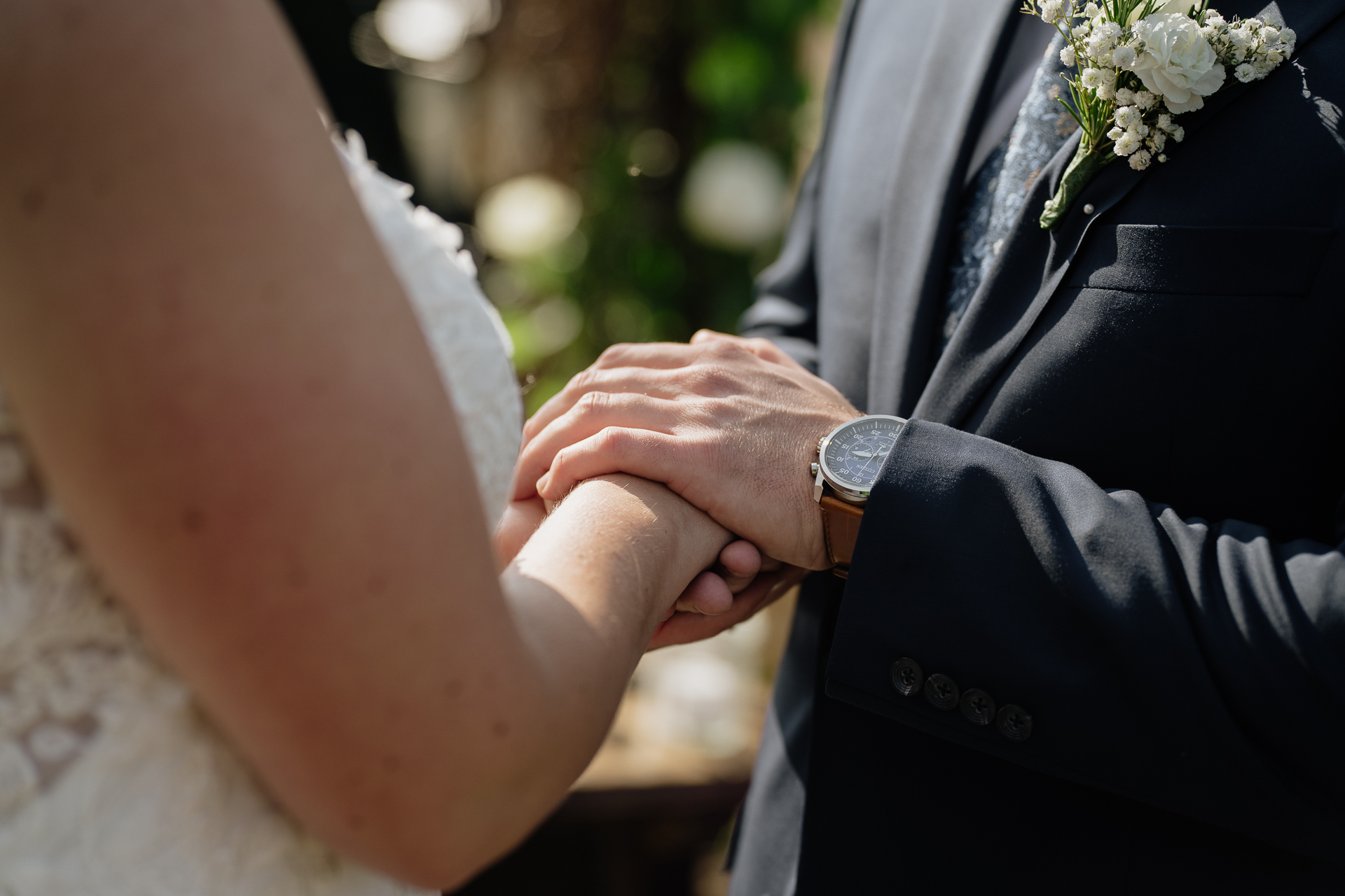 A man and woman holding hands