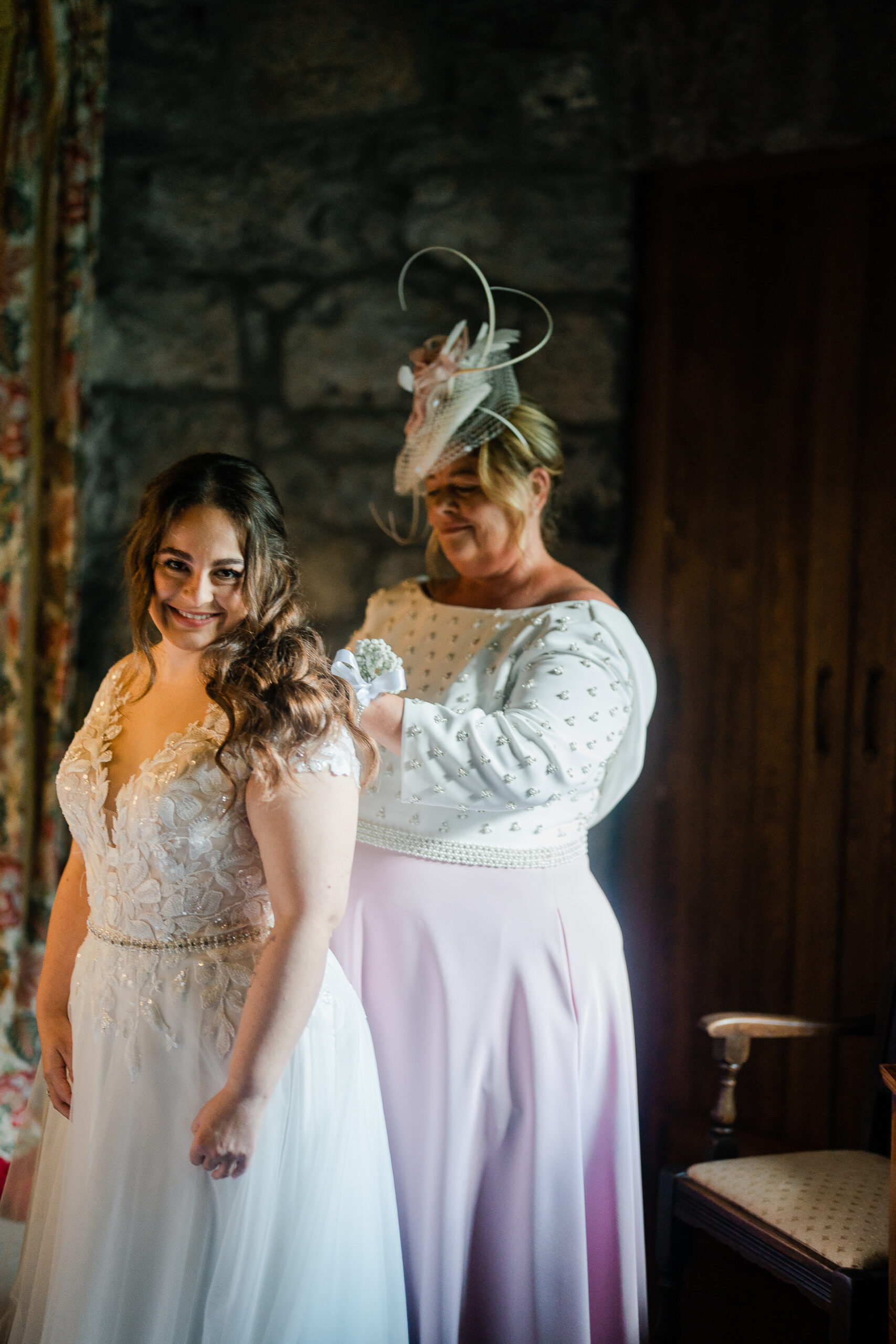 A person in a white dress and a person in a white dress