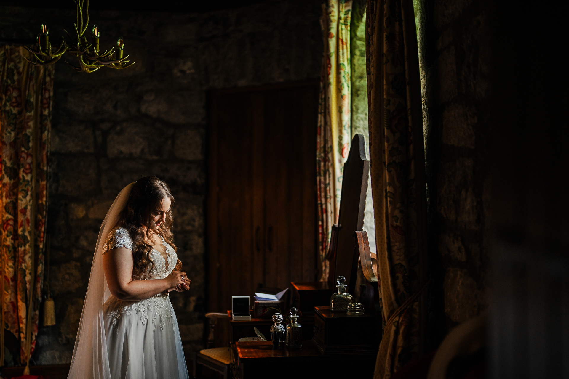 A woman in a dress holding a knife