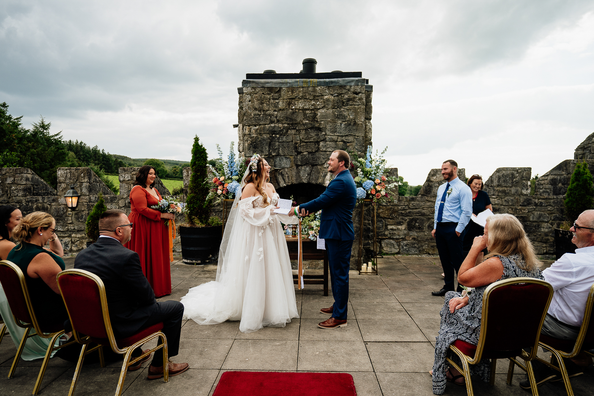 A bride and groom walking down the aisle