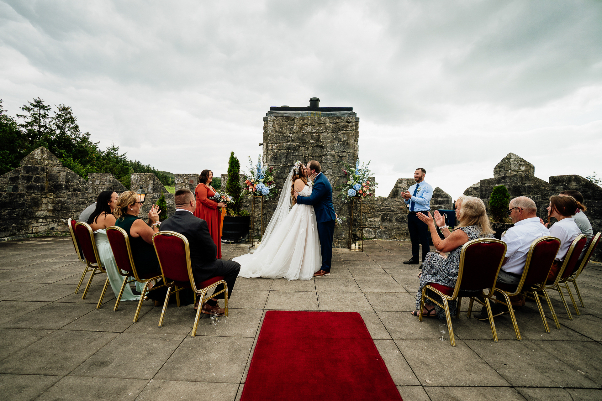 A bride and groom walking down the aisle