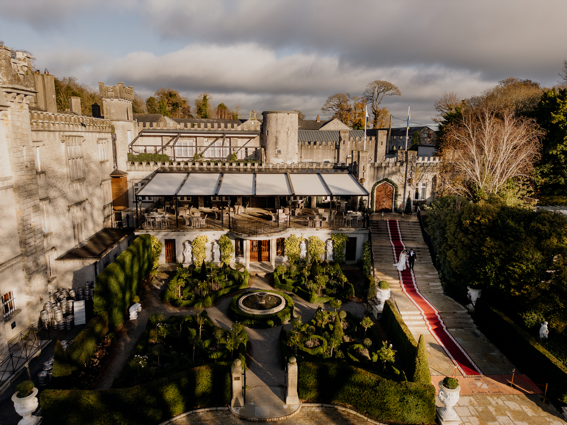 A courtyard with a building in the background