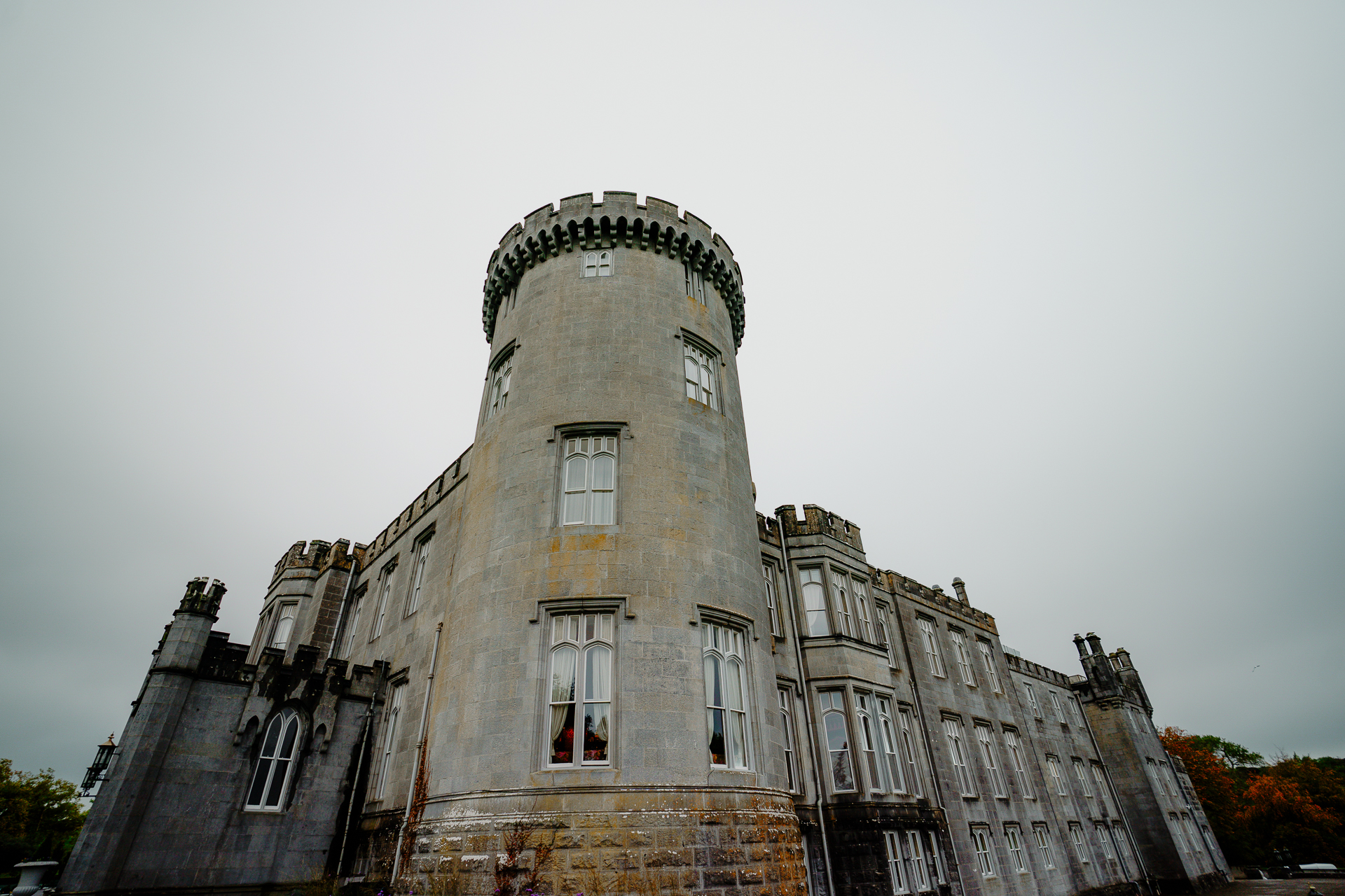 A stone building with a round tower