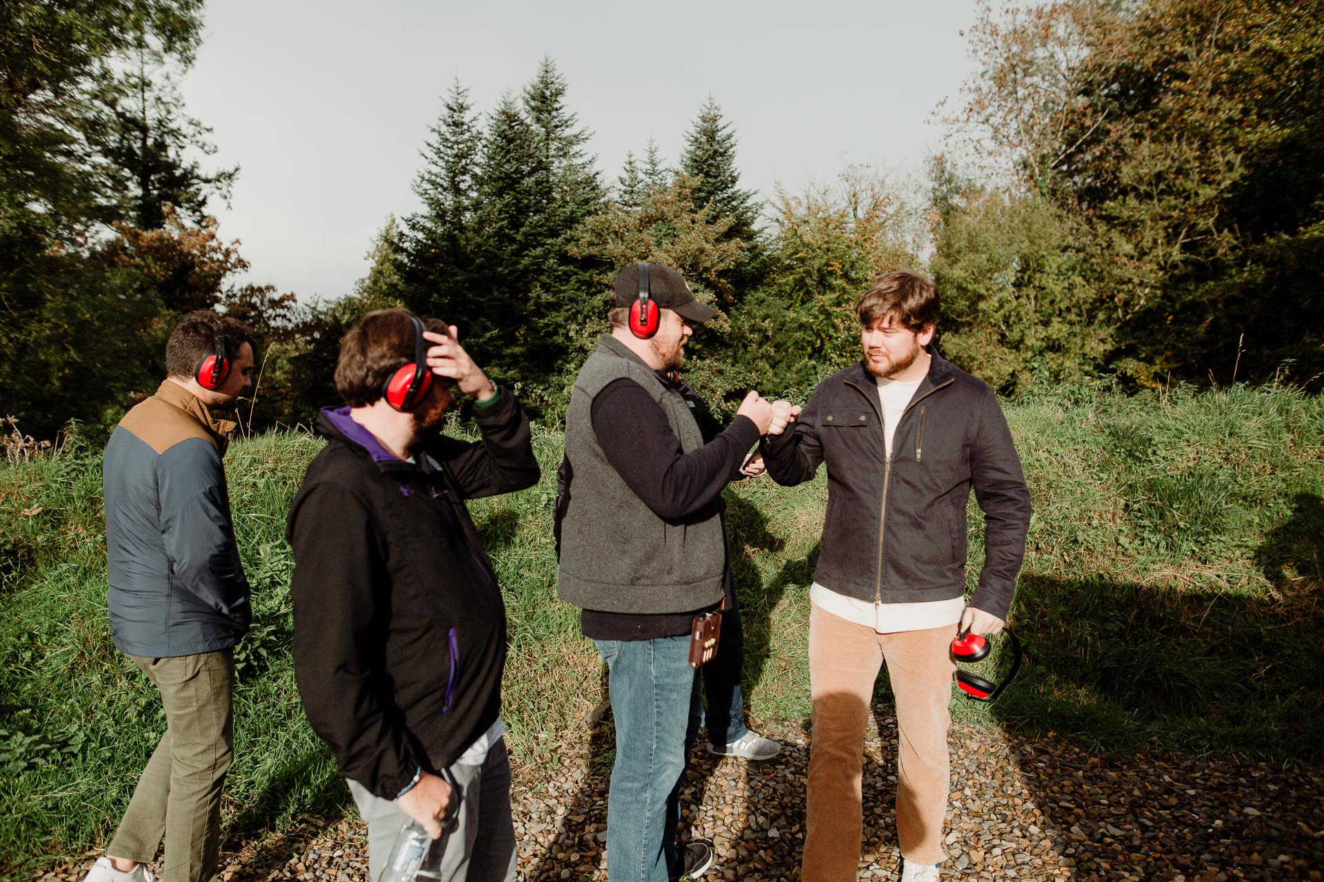 A group of people wearing headphones