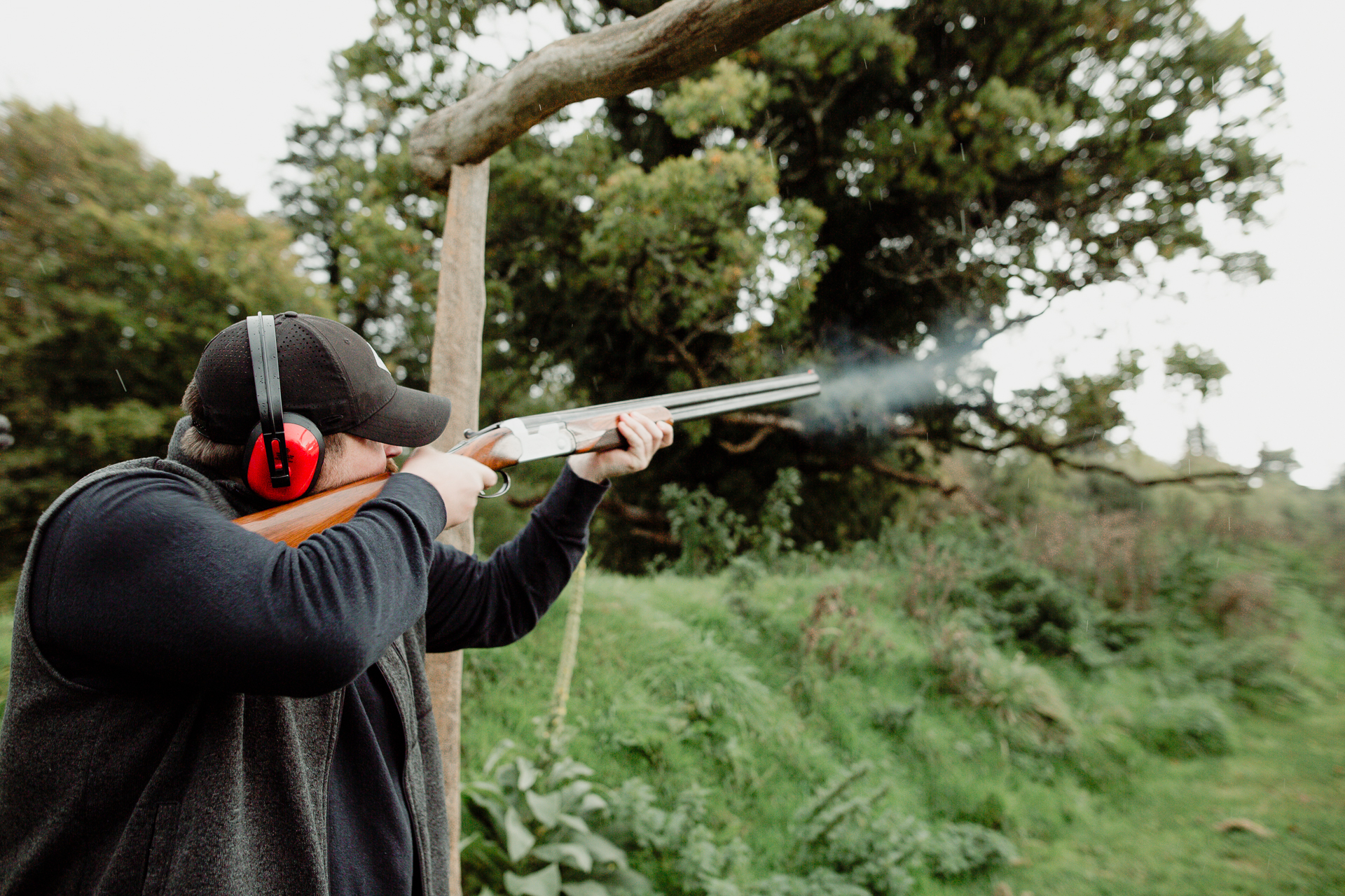 A person holding a large knife