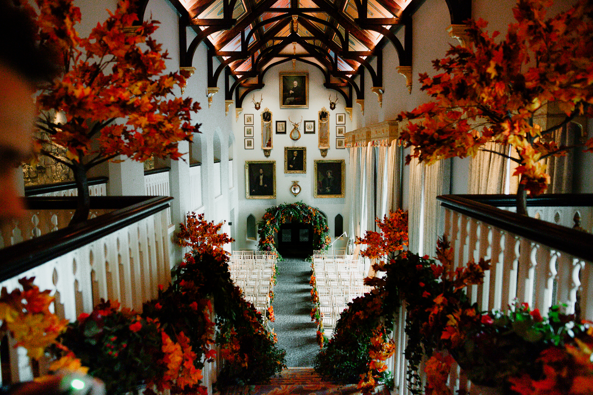 A staircase with flowers on the side