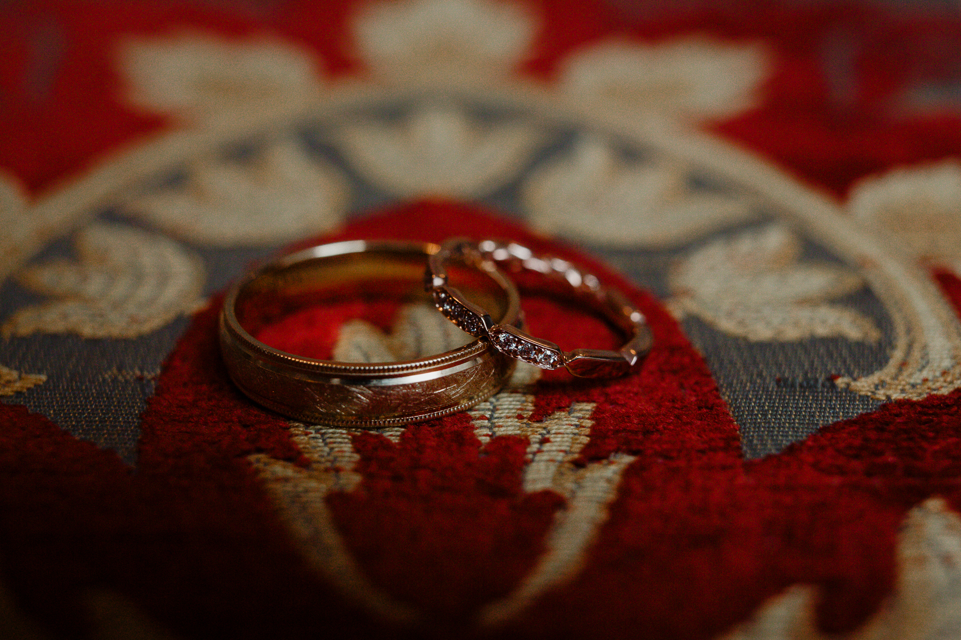 A ring on a red and white cloth