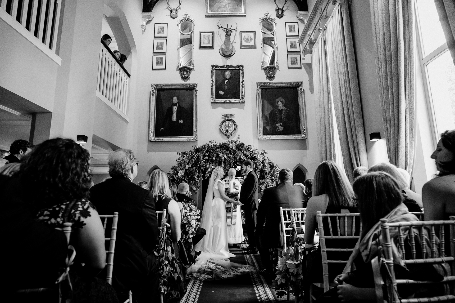 A bride and groom walking down the aisle