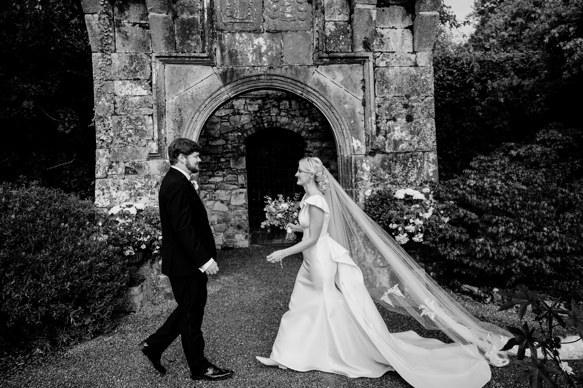 A bride and groom walking down the aisle