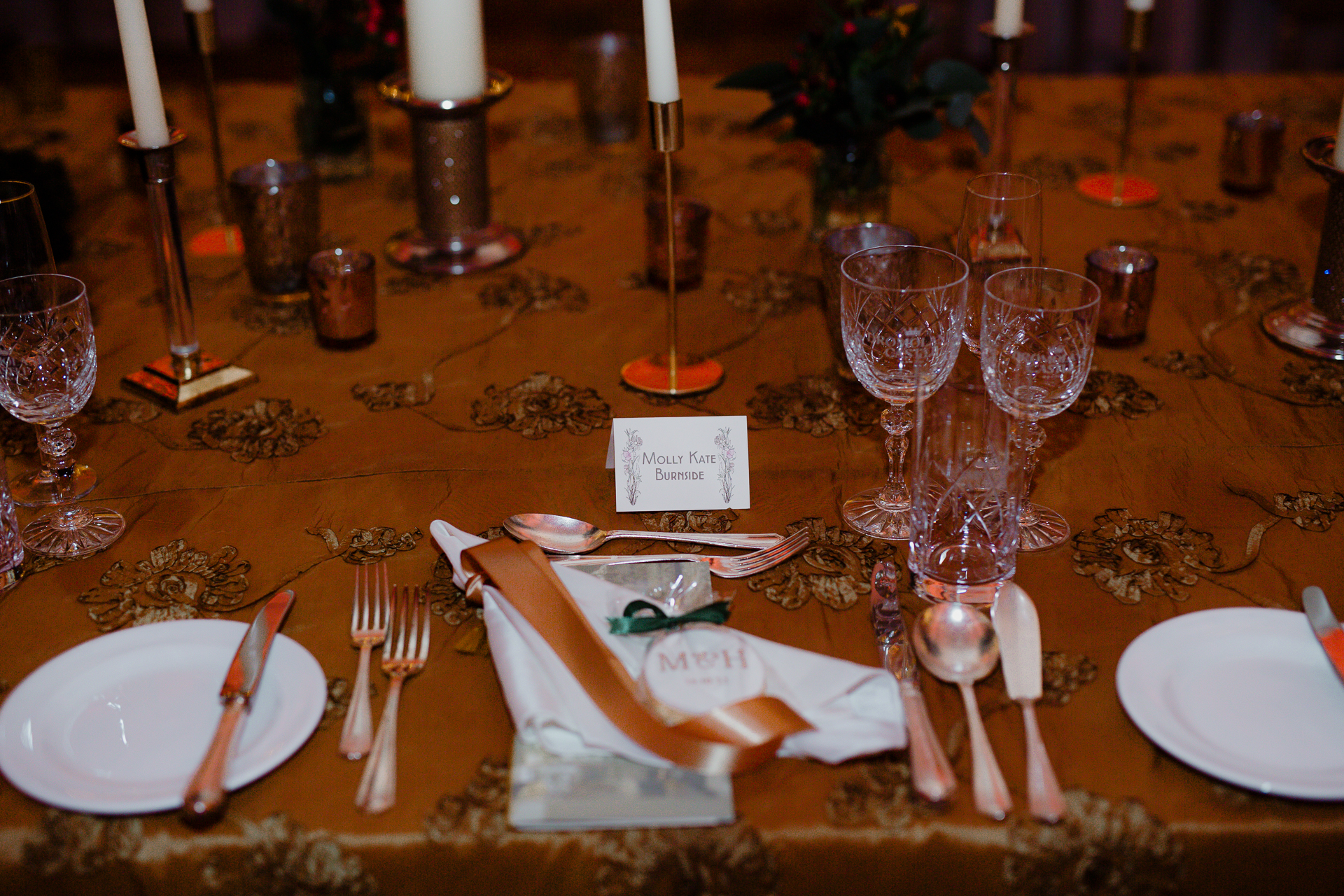 A table with plates and silverware