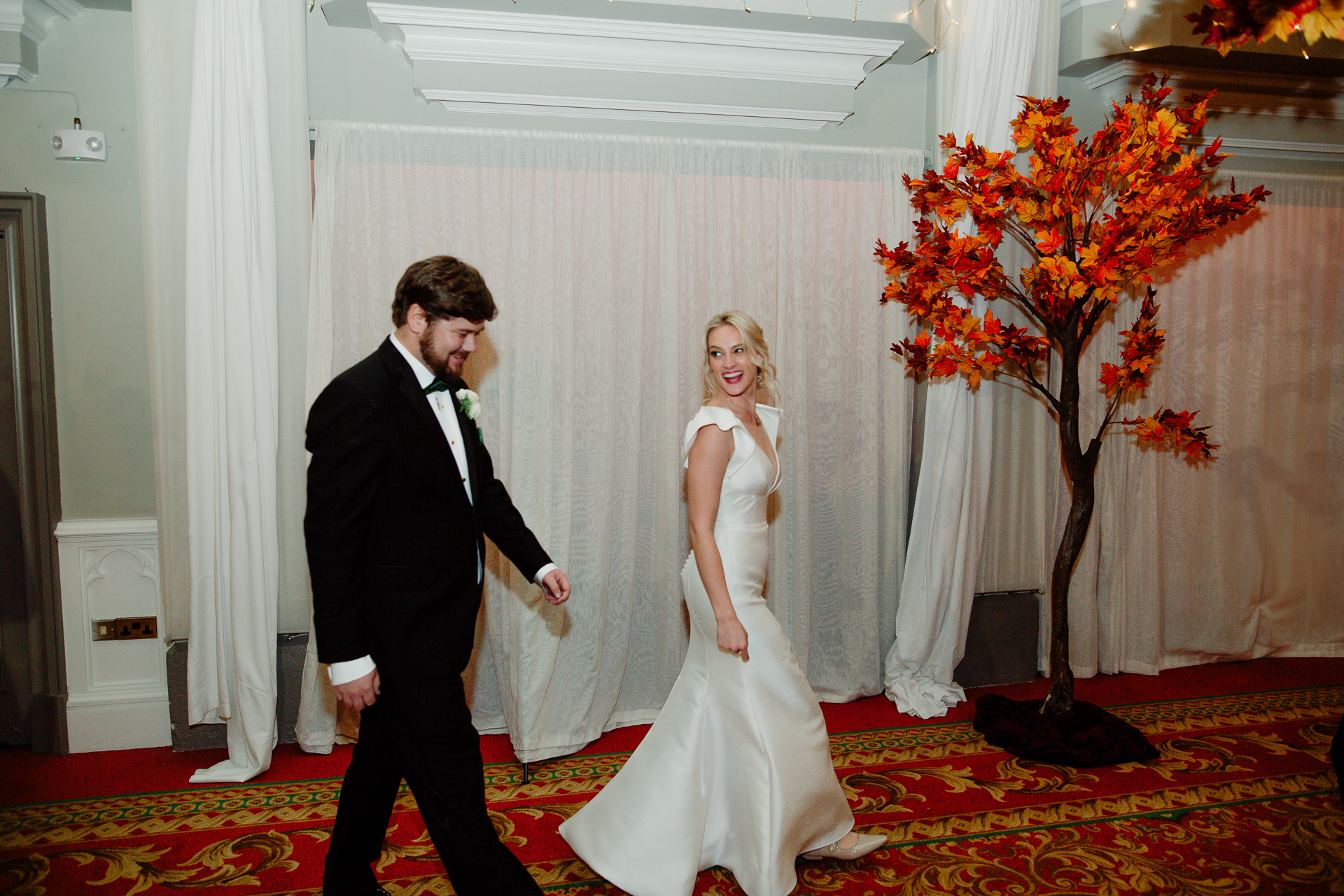 A man and woman in wedding attire