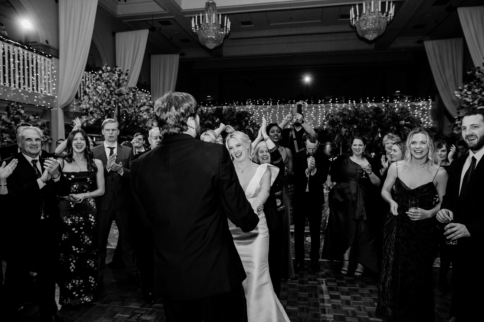 A man and woman dancing at a wedding reception