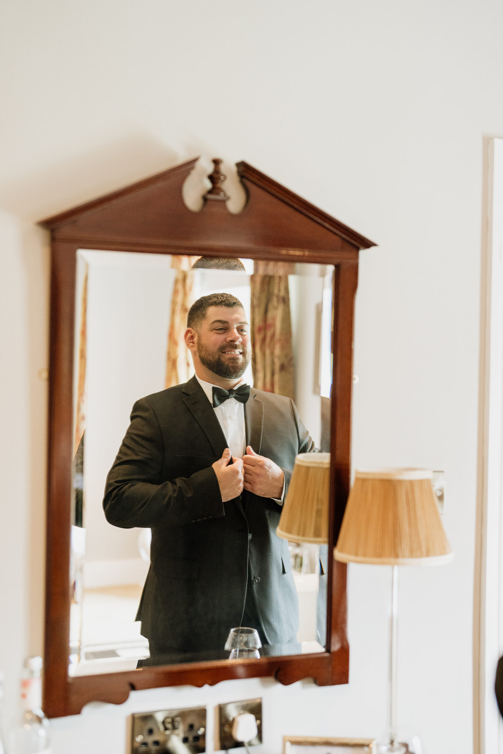 A man in a suit in a mirror