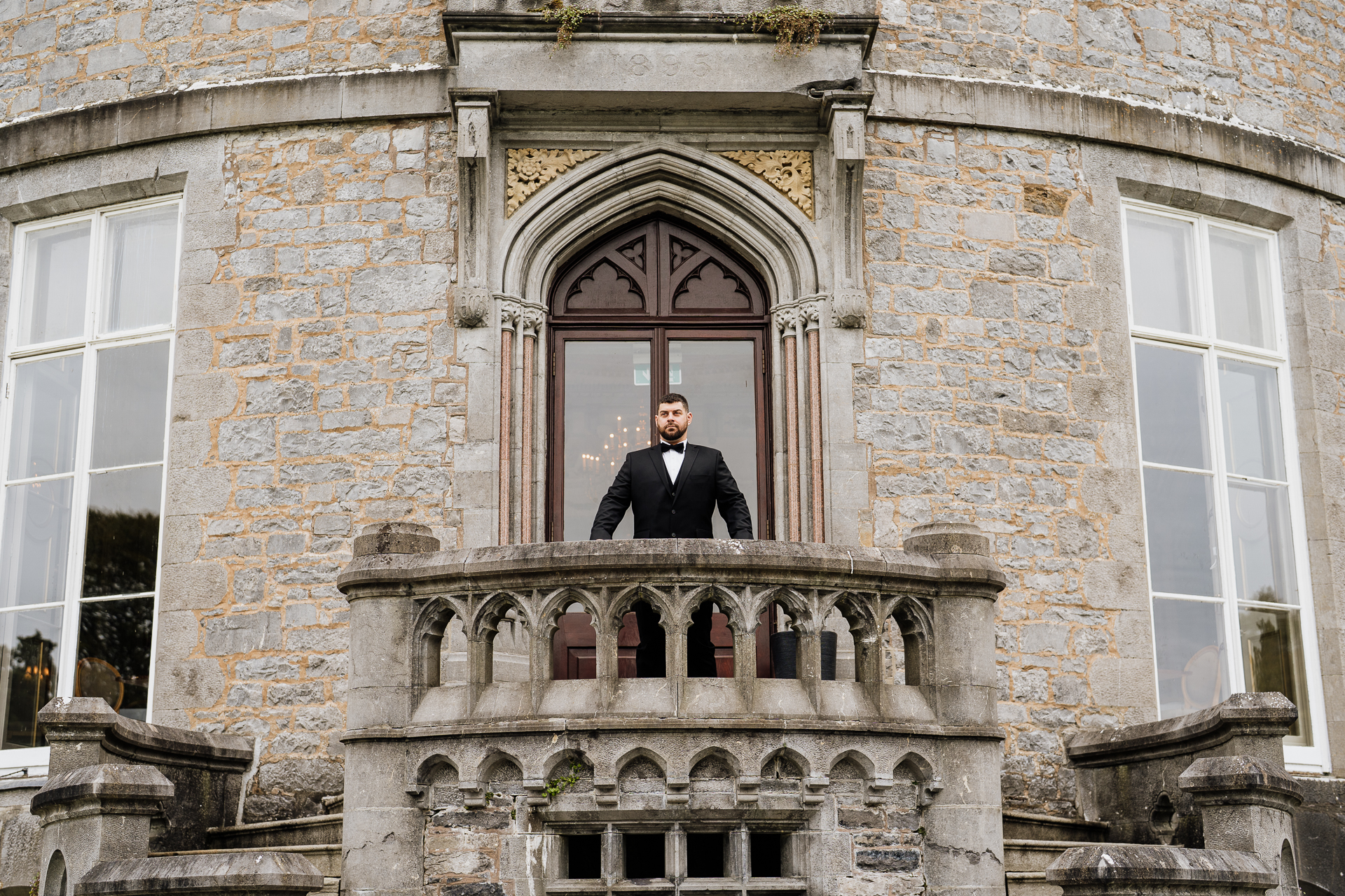 A person standing in a doorway of a building