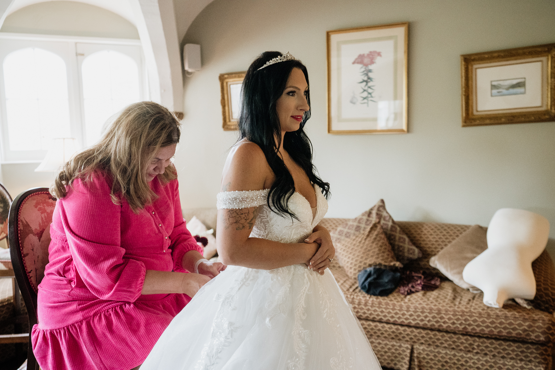 A woman in a white dress and a girl in a white dress