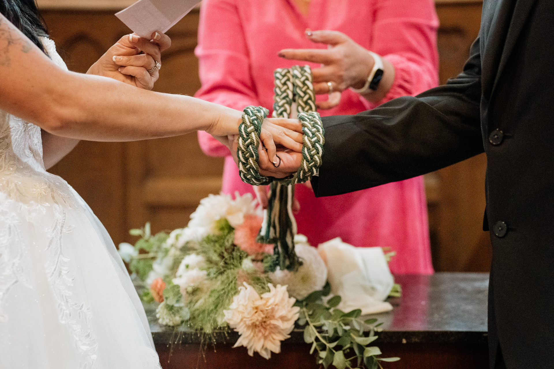 A man and woman holding hands