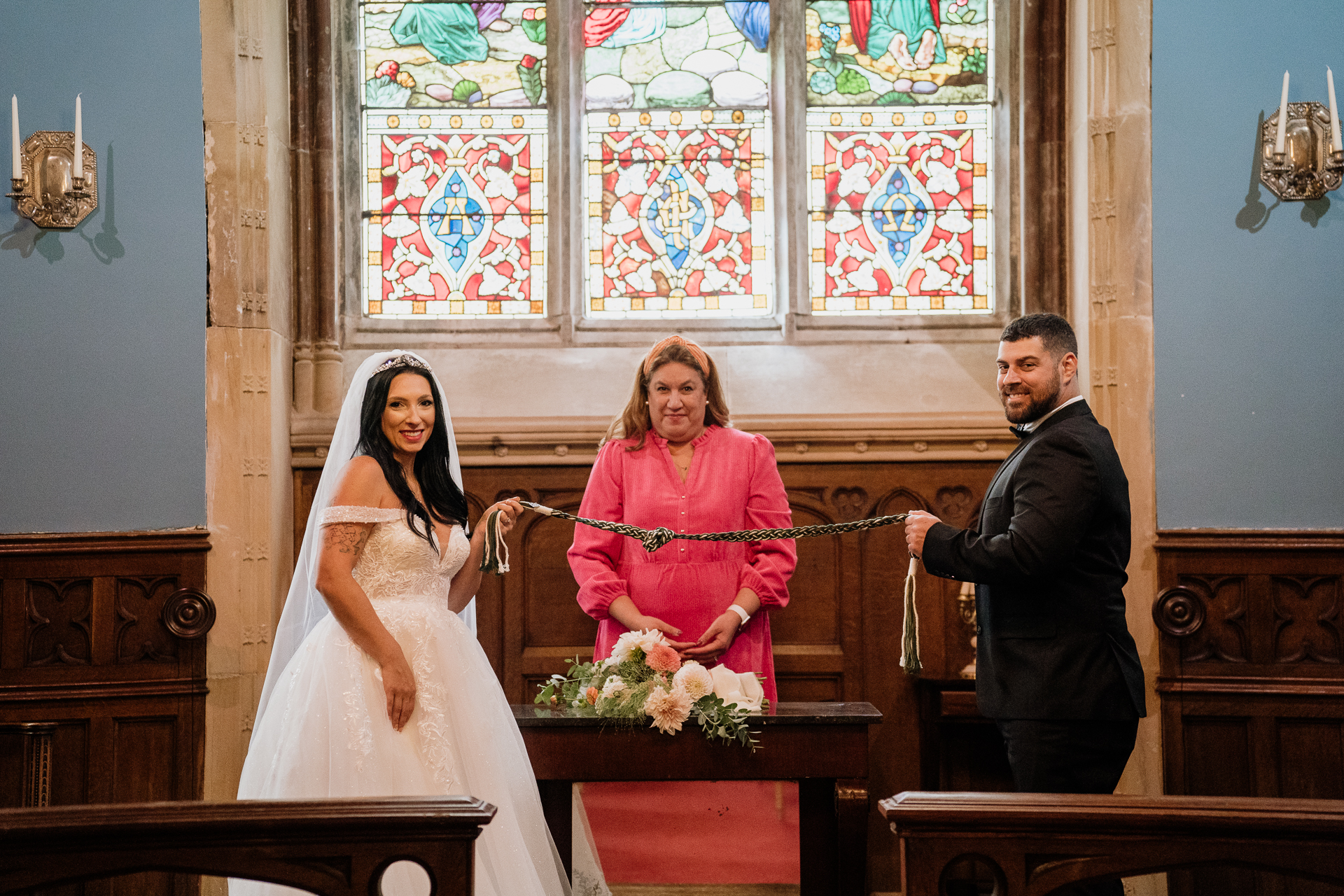 A bride and groom at a church