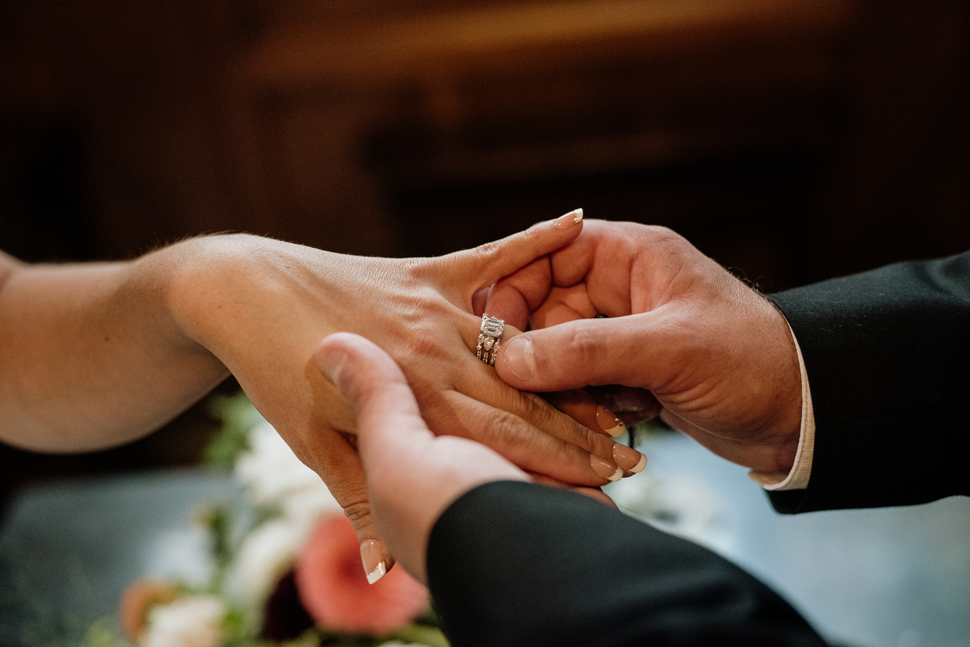 A close-up of hands holding each other