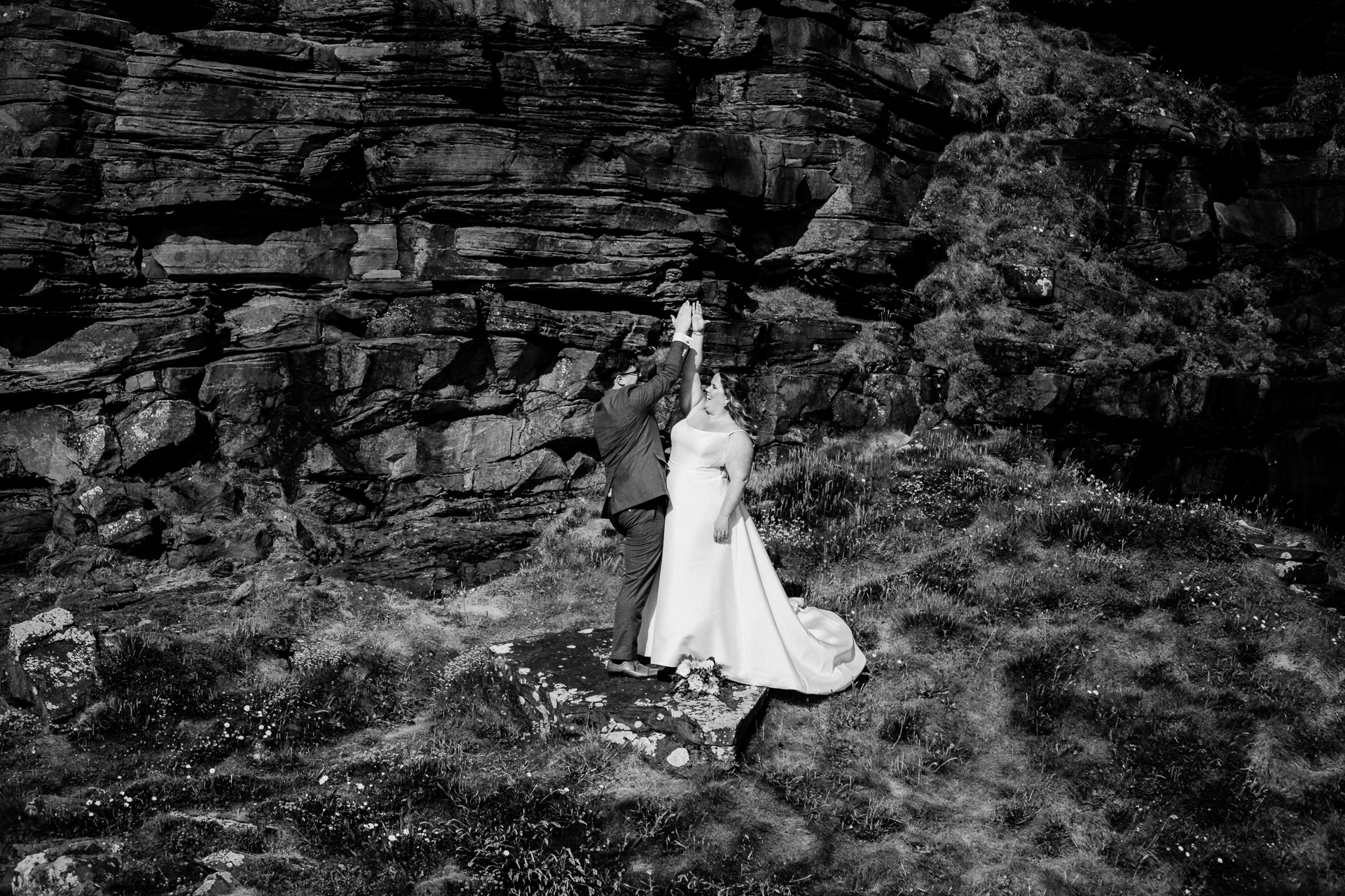 A man and woman in wedding attire