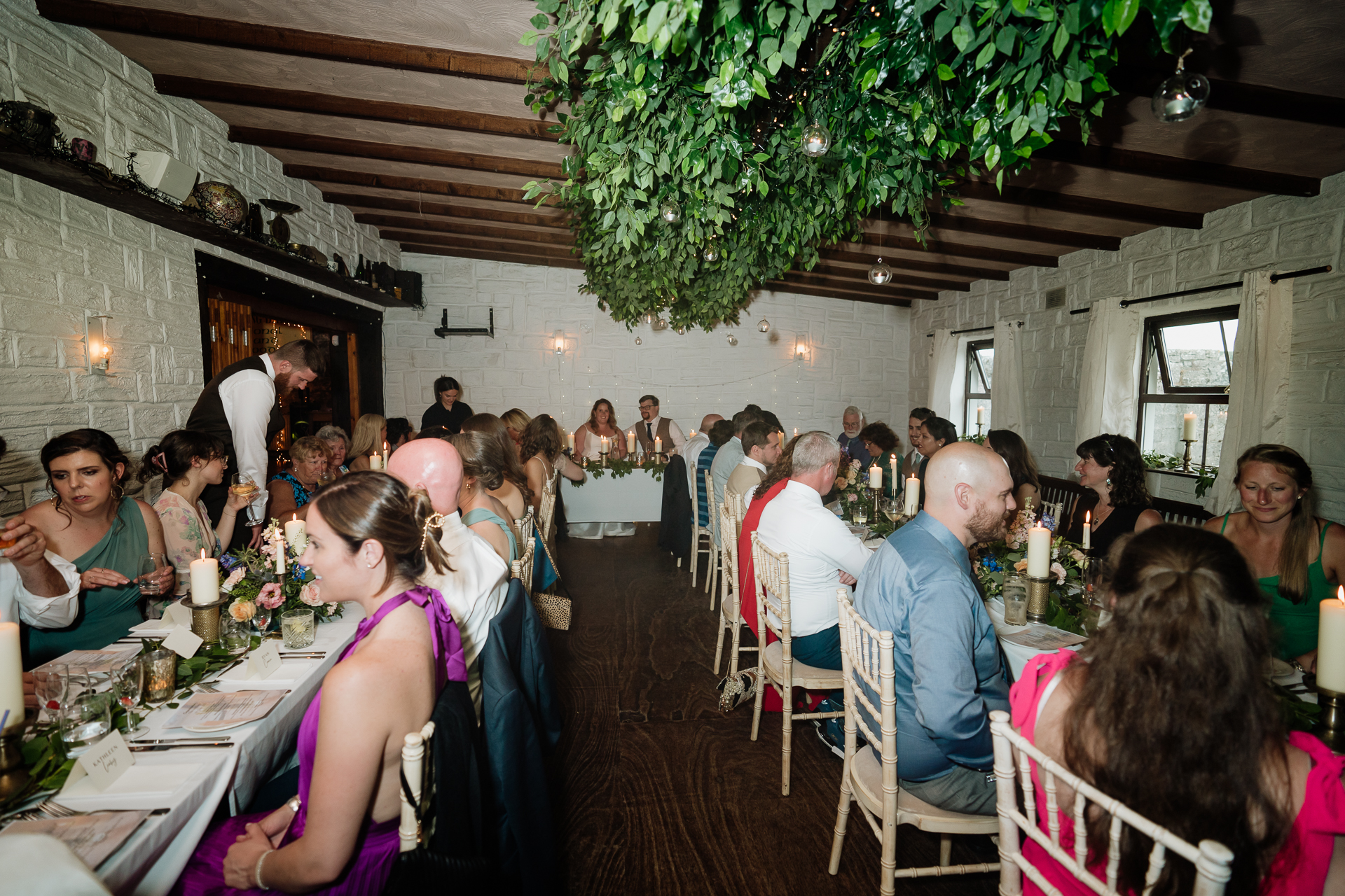 A group of people sitting at tables