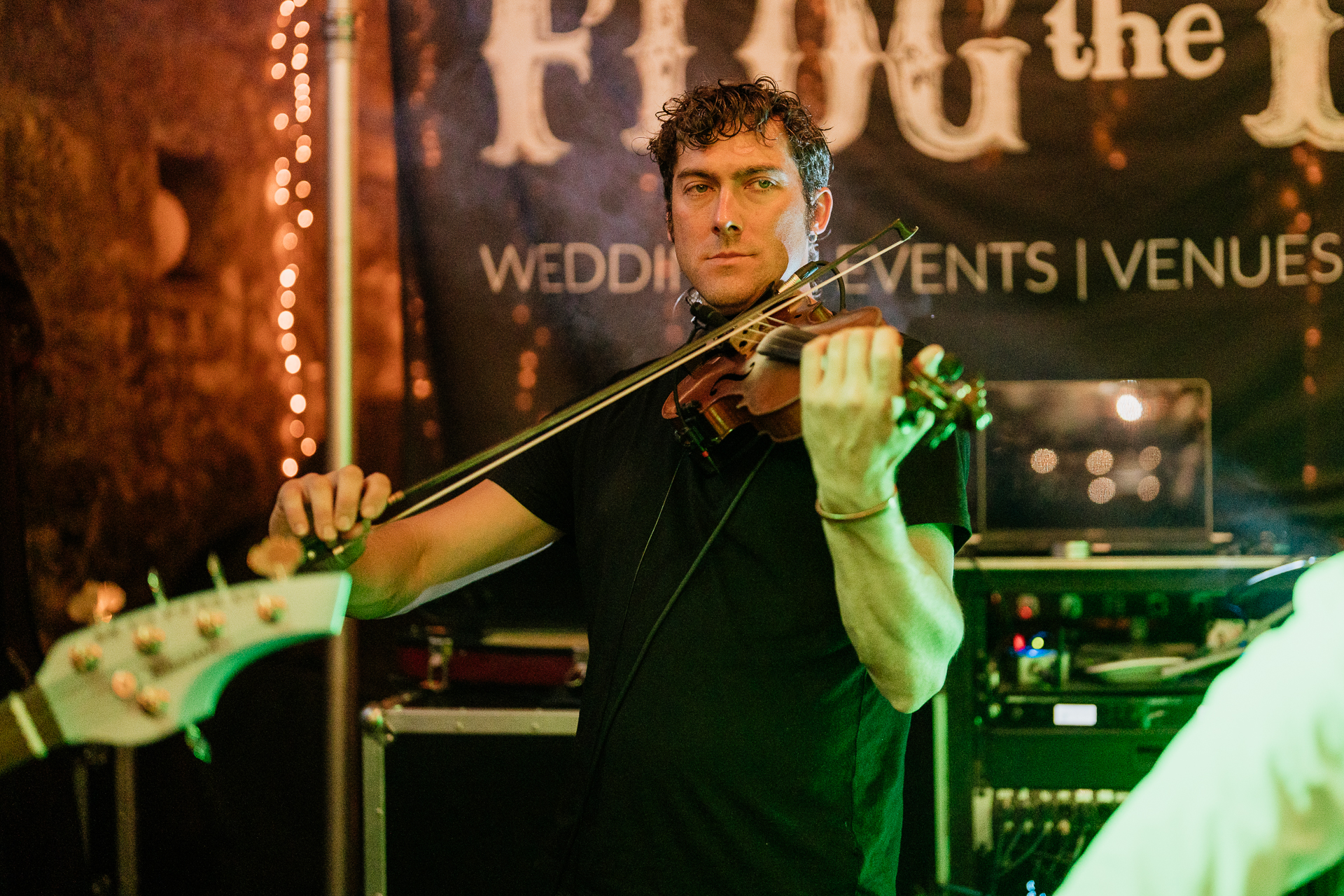 A man playing a guitar