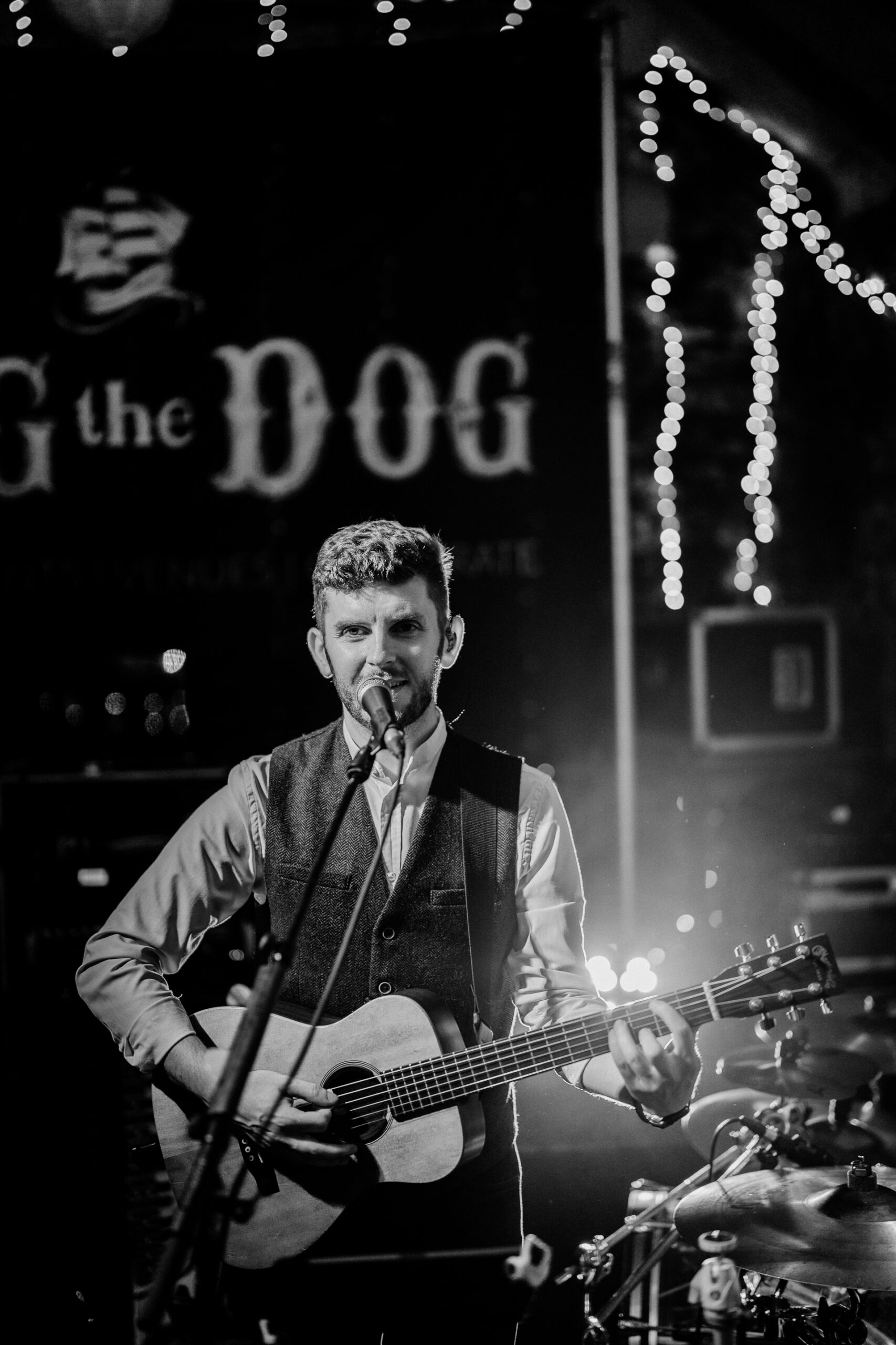 A man playing a guitar