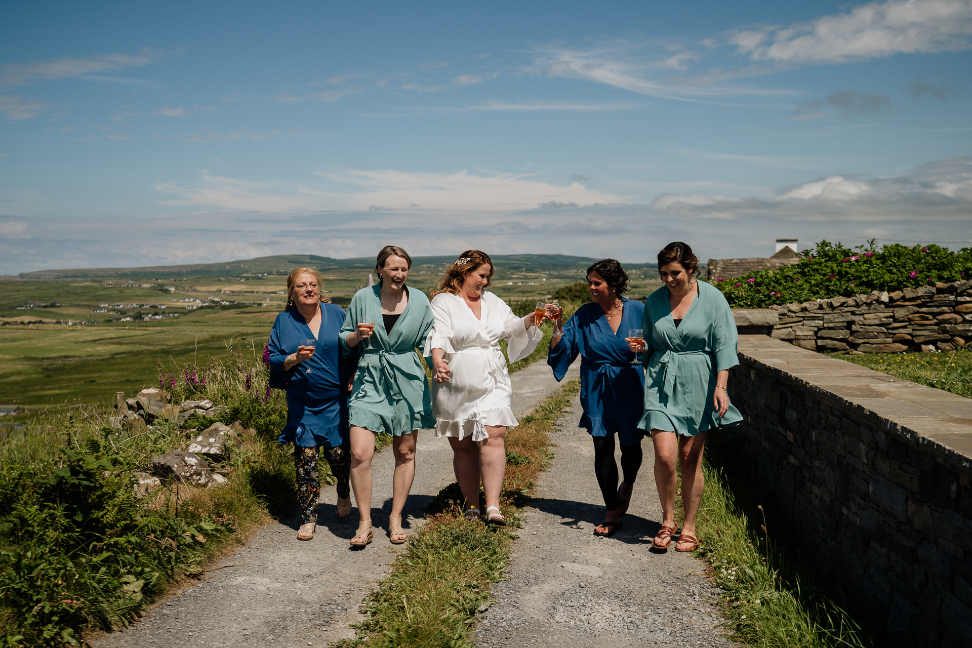 A group of women walking on a path