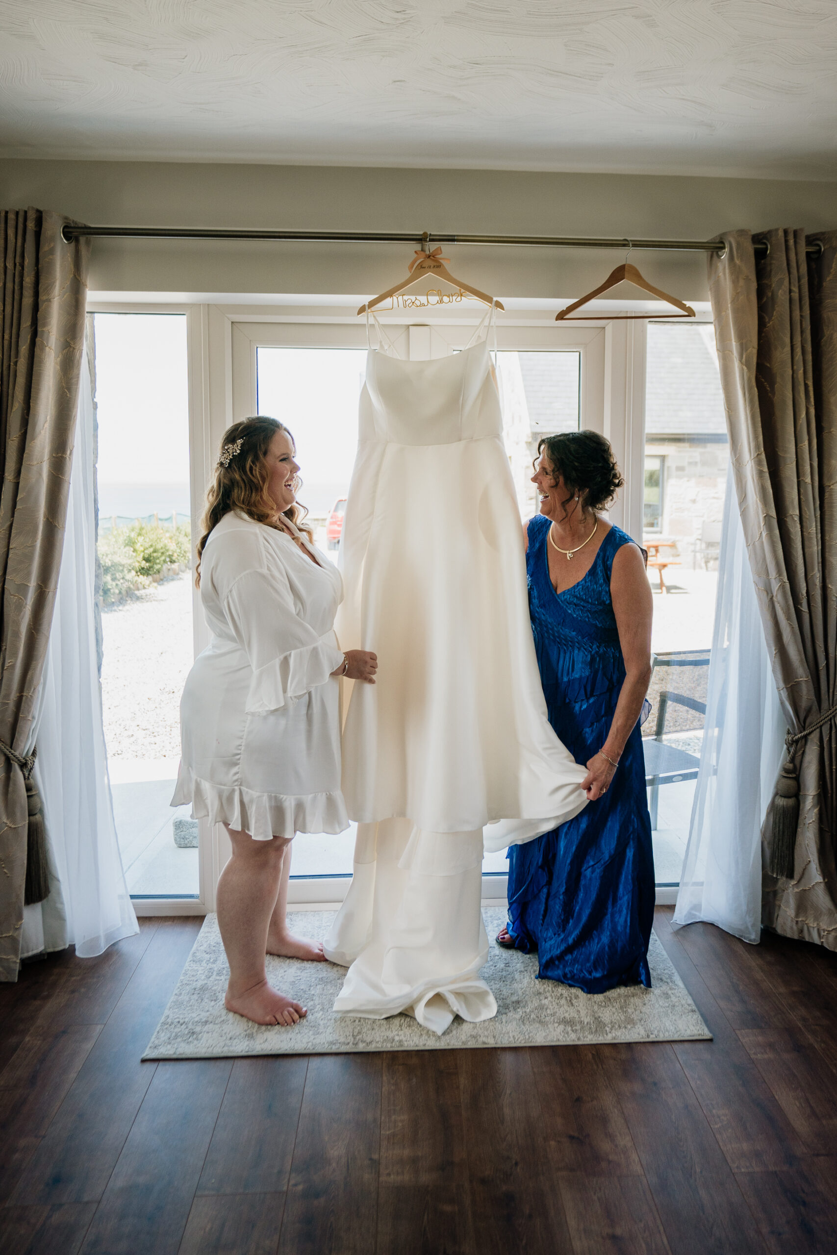 A person in a white dress and a person in a white dress