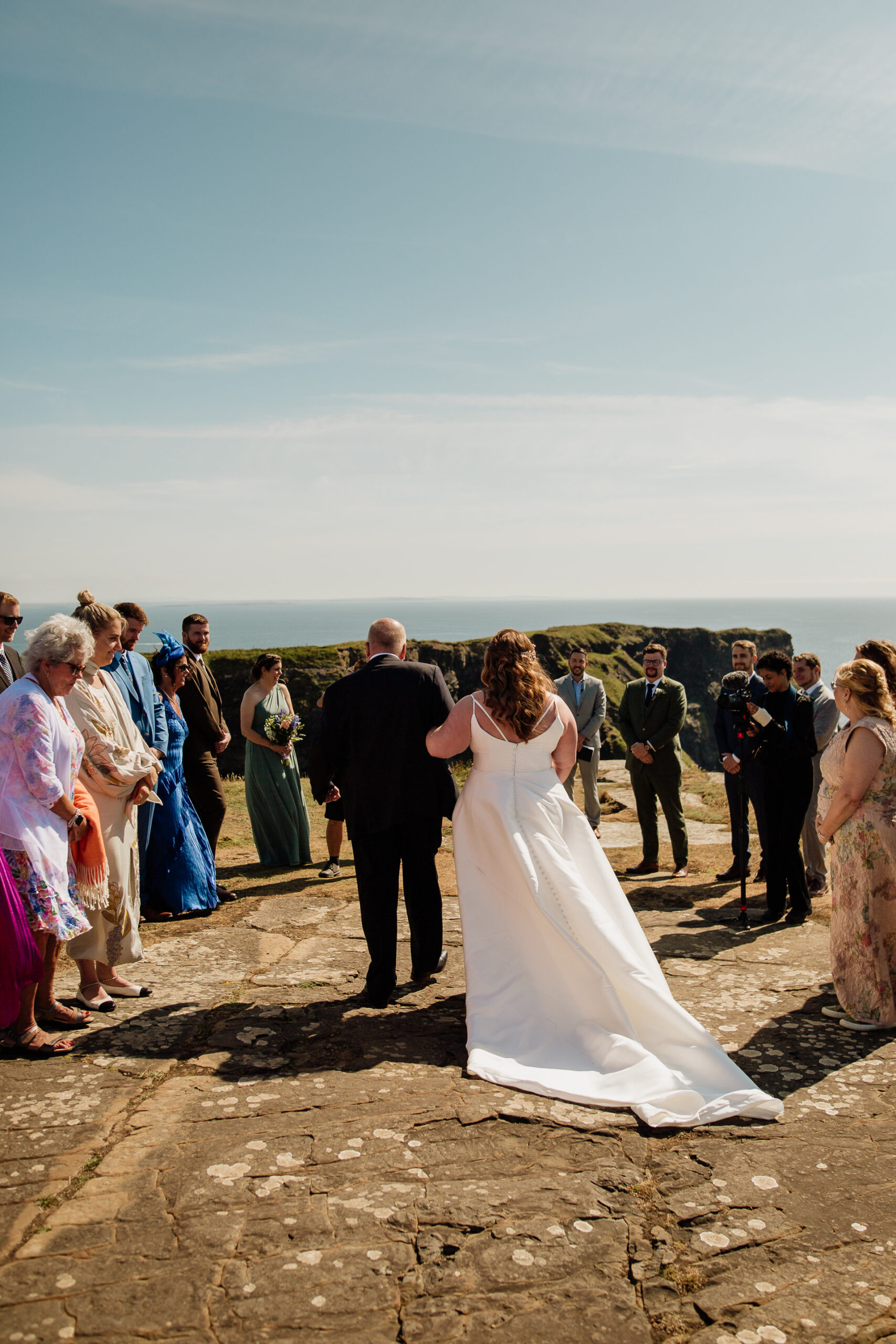 A bride and groom walking down the aisle