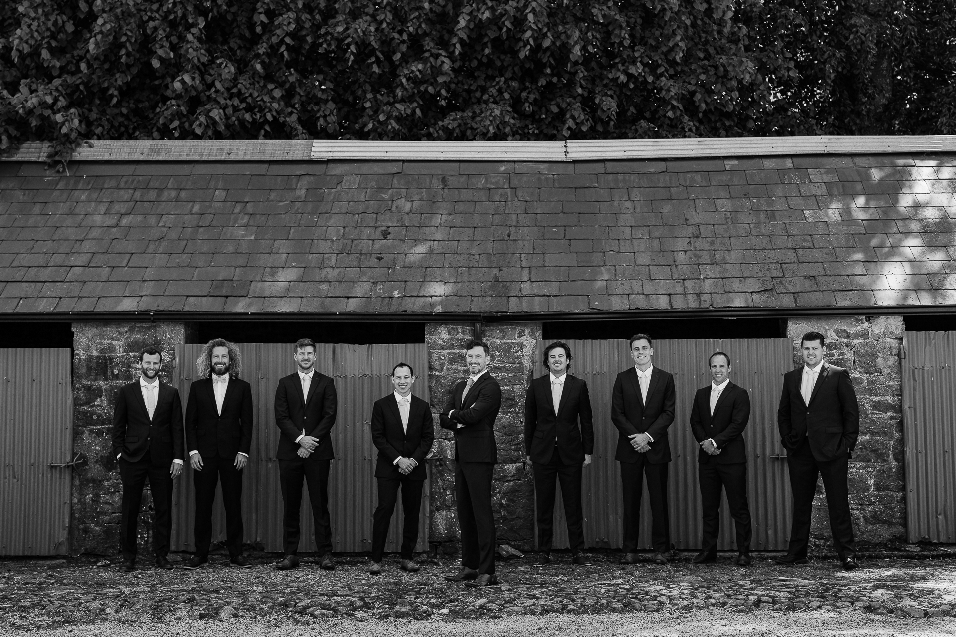 A group of people standing in front of a building