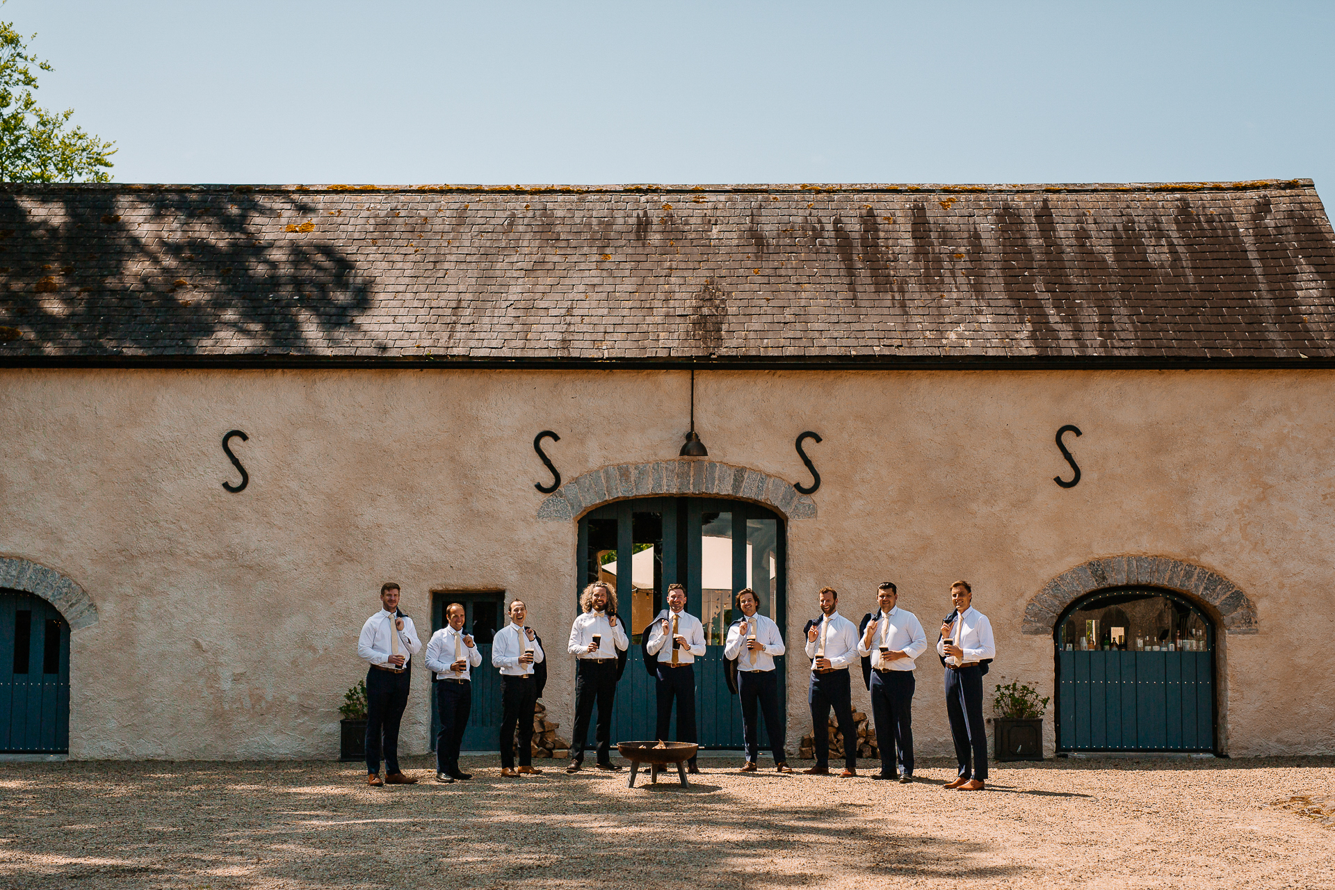 A group of people standing in front of a building