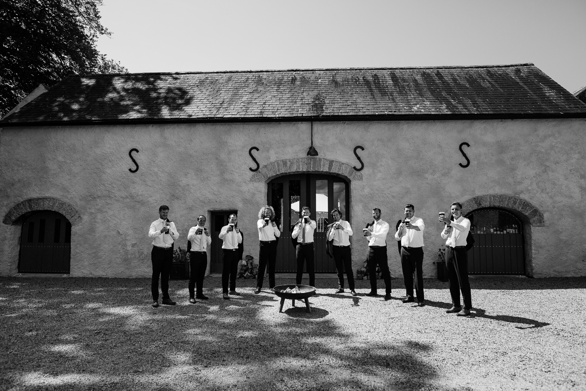 A group of people standing in front of a building