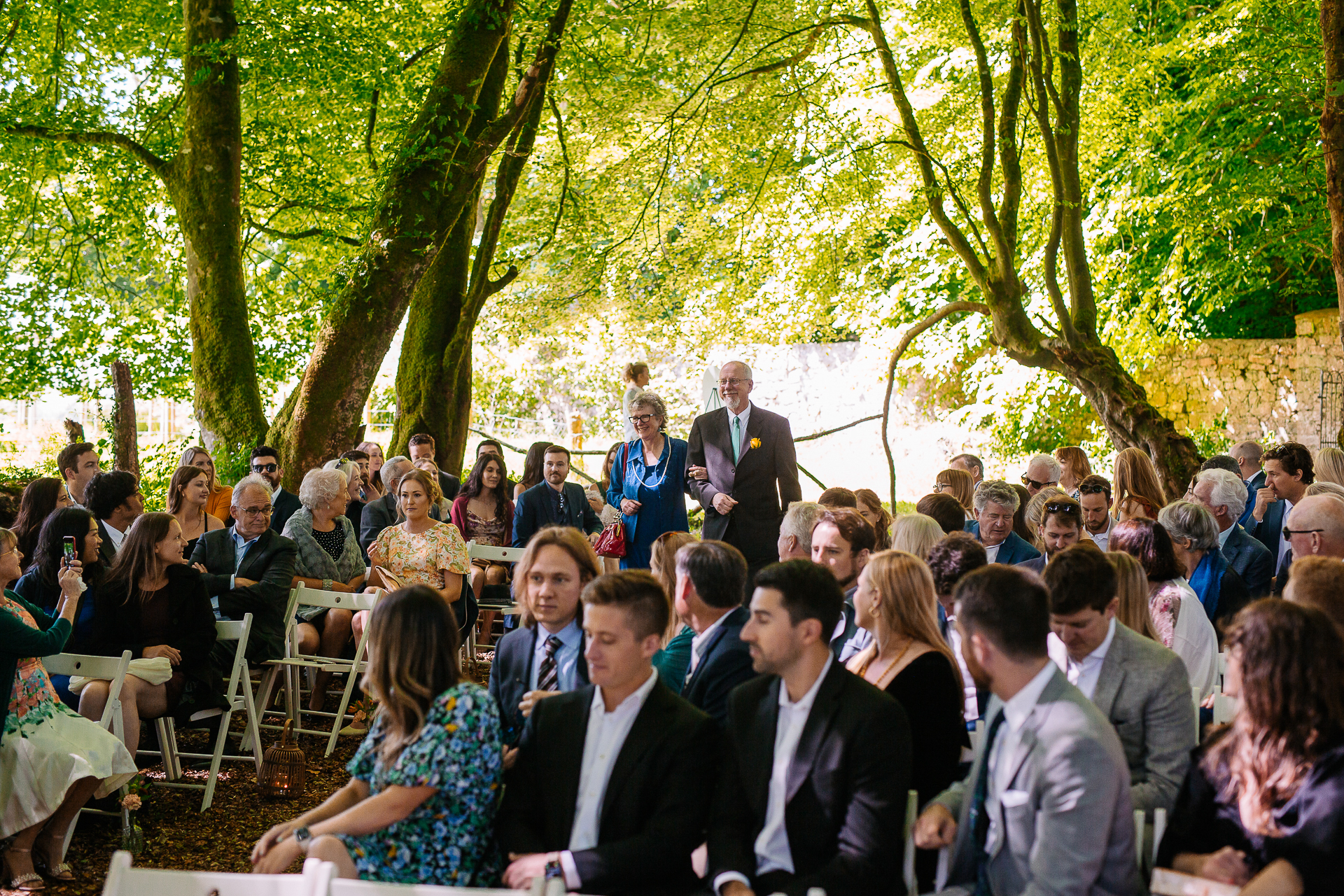 A group of people sitting in chairs