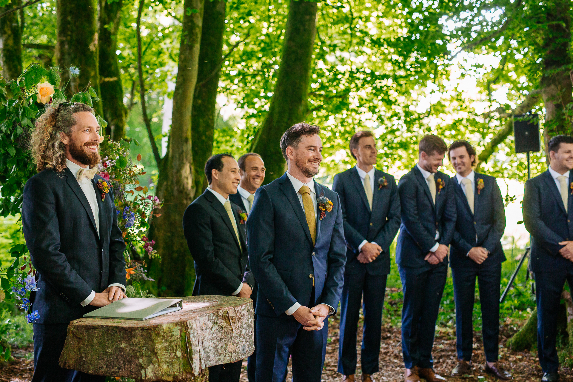 A group of men standing outside