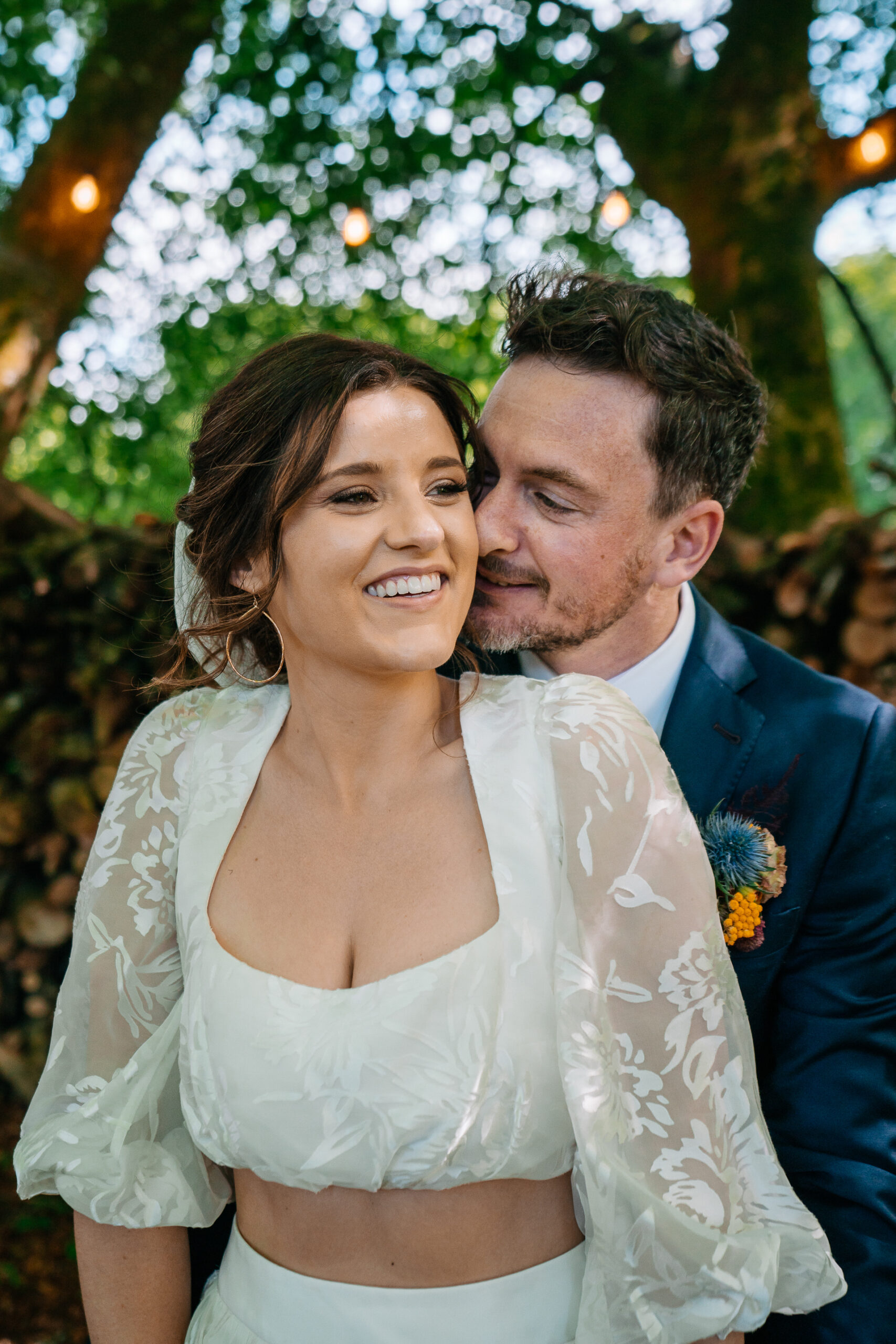 A man and woman posing for a picture