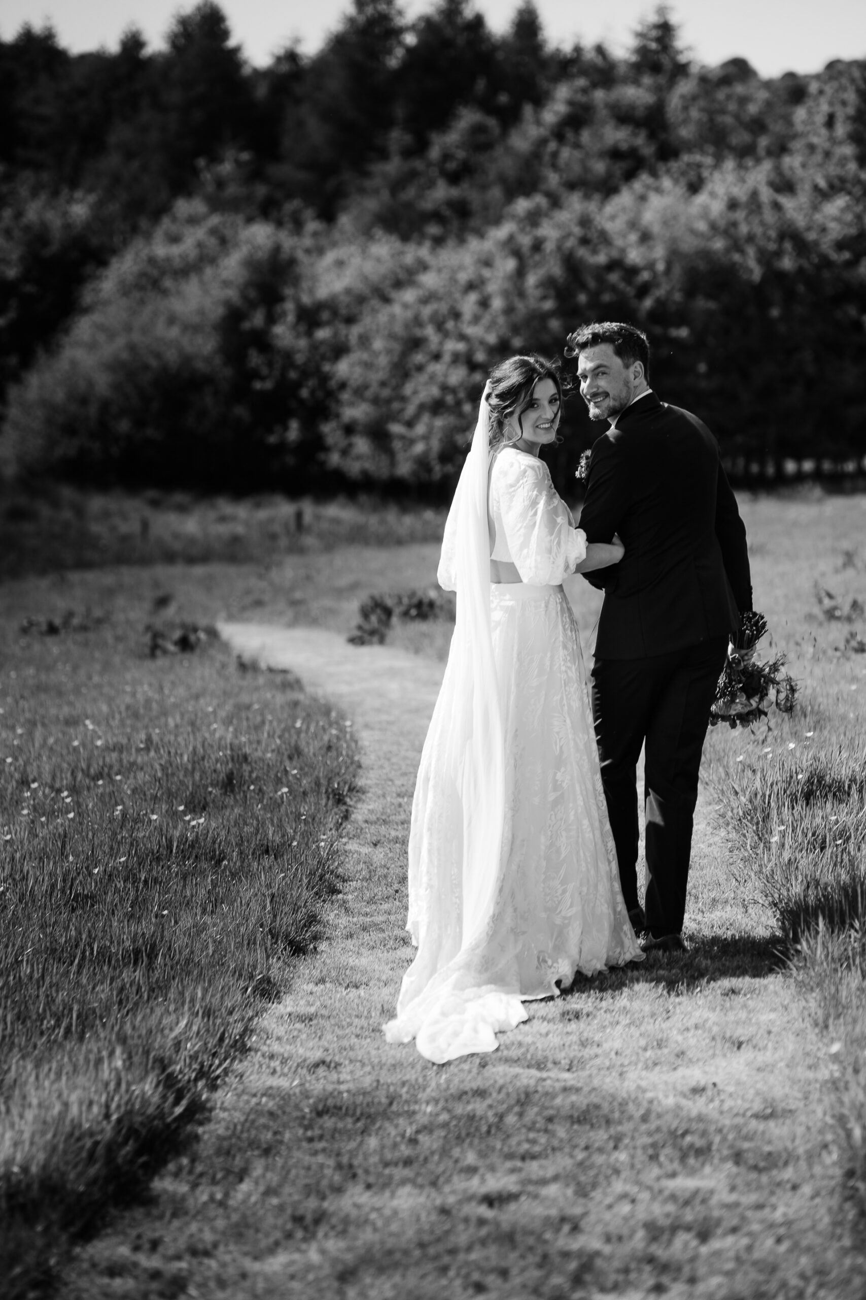 A man and woman in wedding attire