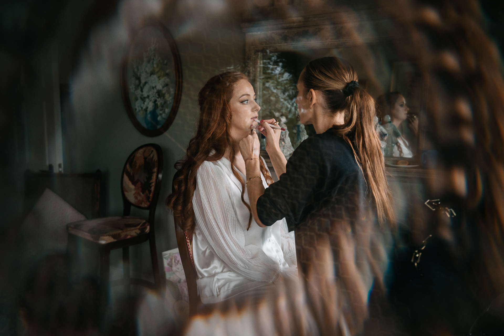 A person in a white dress and a person in a white dress