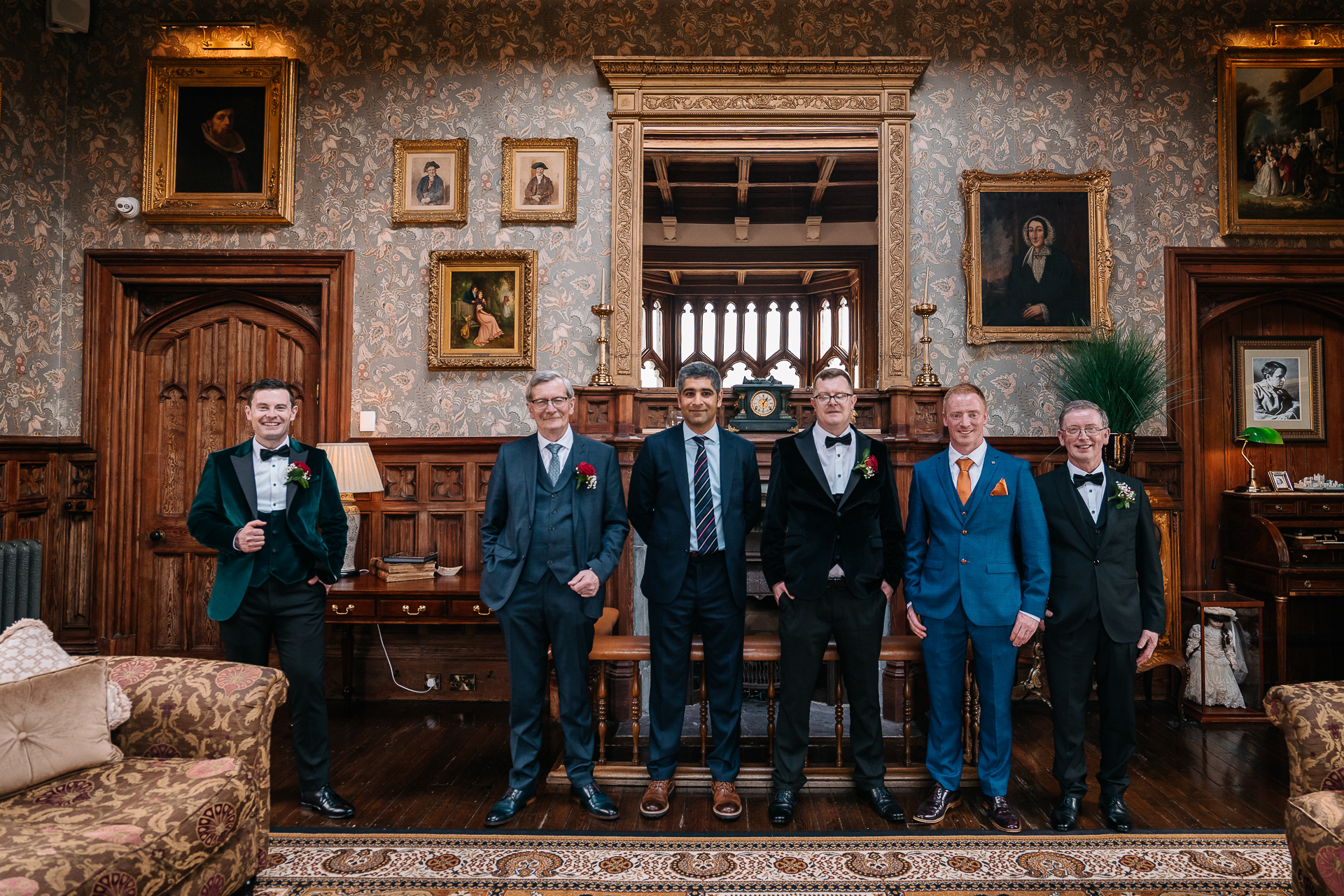 A group of men posing for a photo