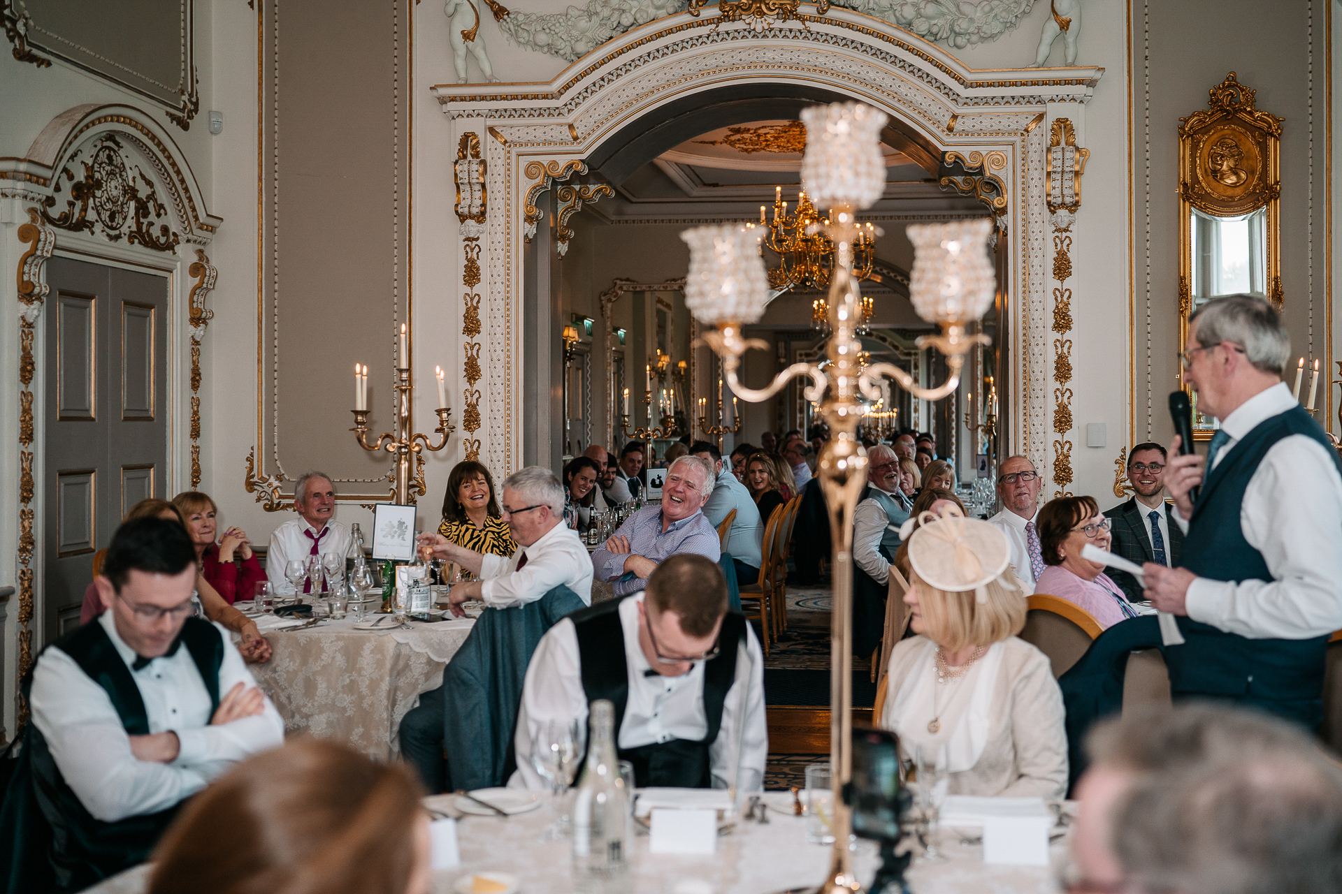 A group of people sitting at tables