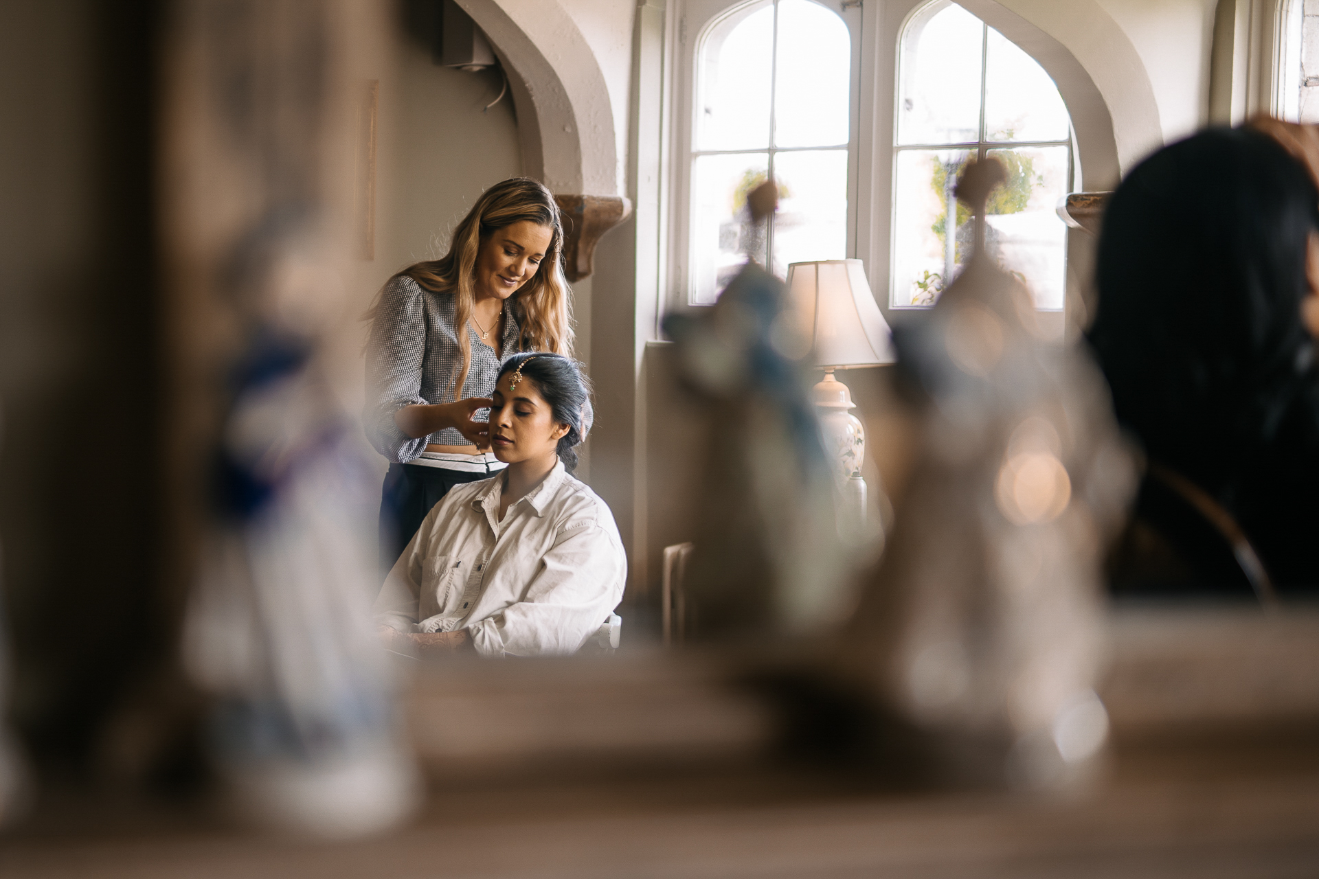 A person and a child sitting at a table