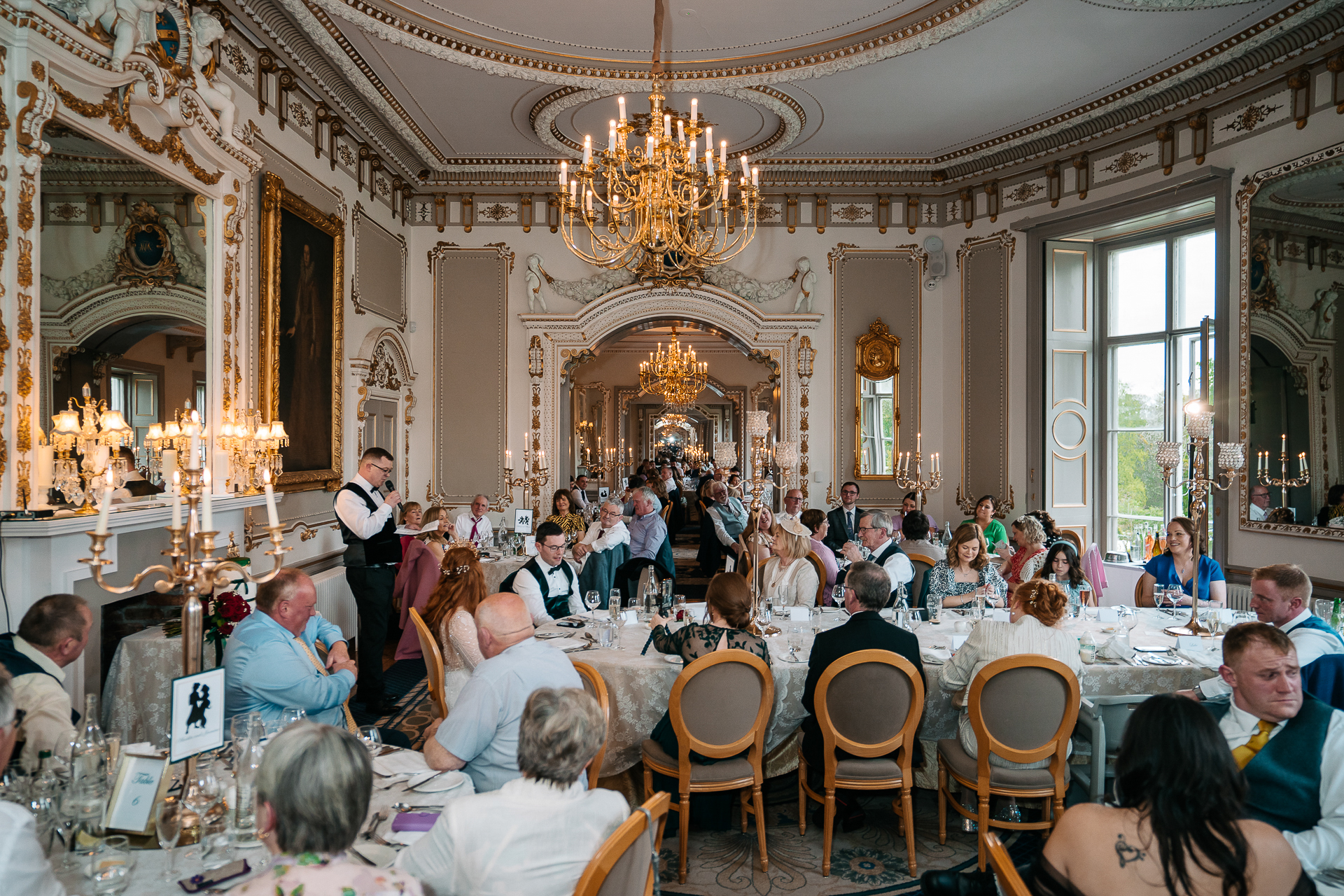 A group of people sitting at tables